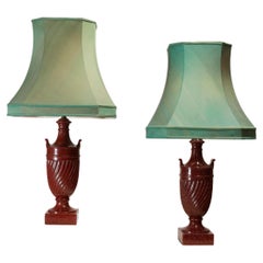 A pair of simulated porphyry table lamps in the shape of urns