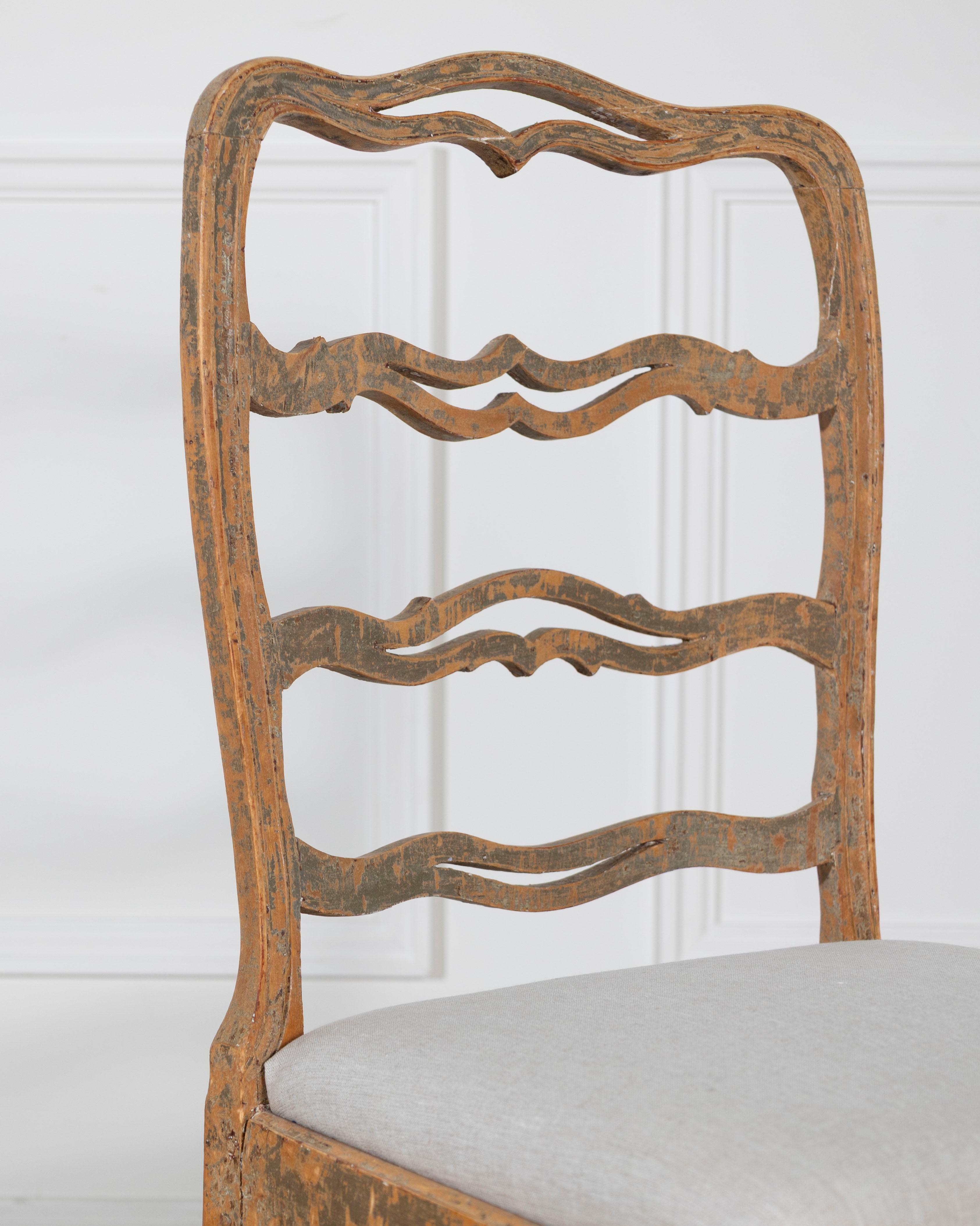 A pair of slender Gustavian chairs with smiling details Circa 1780 For Sale 5