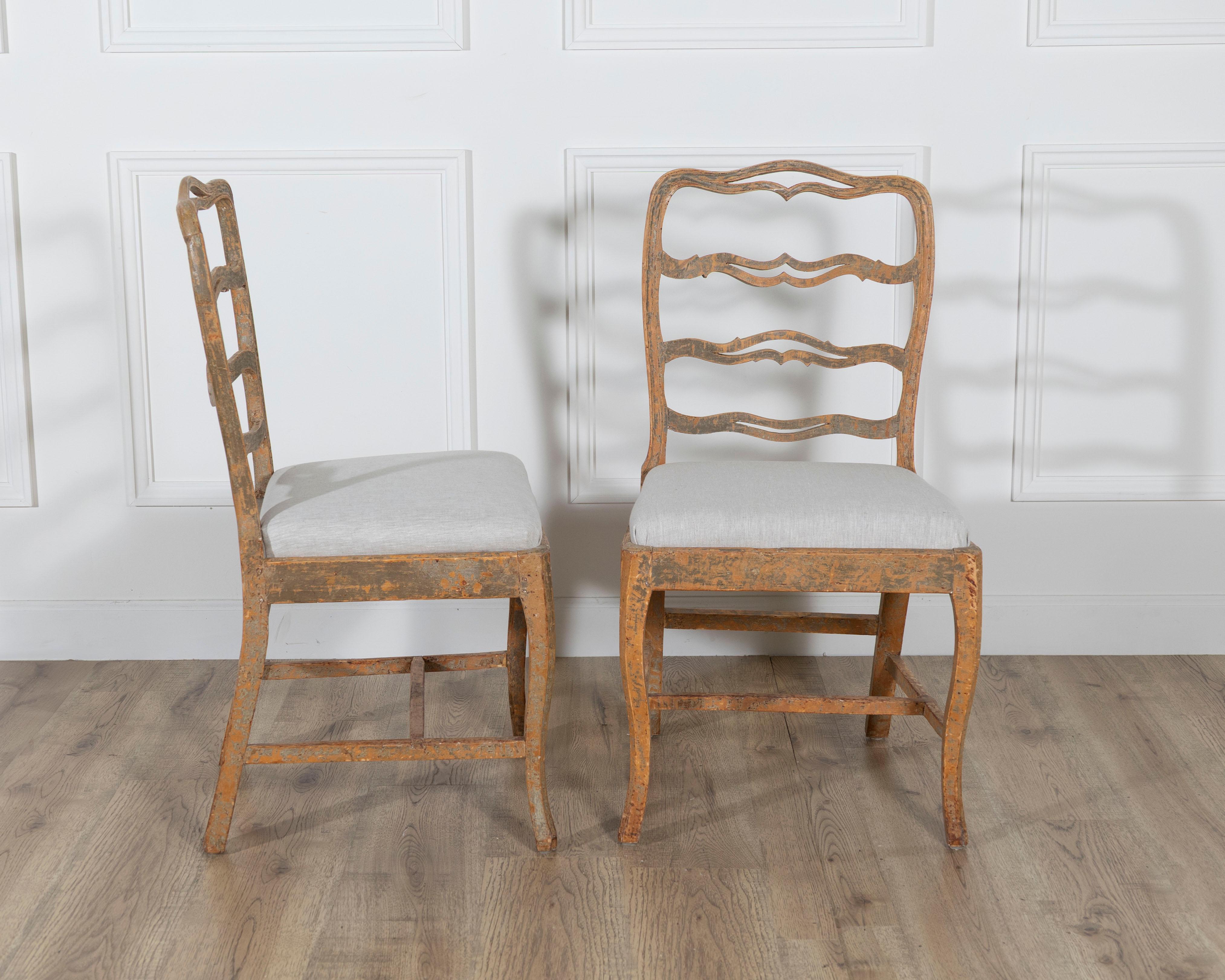 18th Century and Earlier A pair of slender Gustavian chairs with smiling details Circa 1780 For Sale