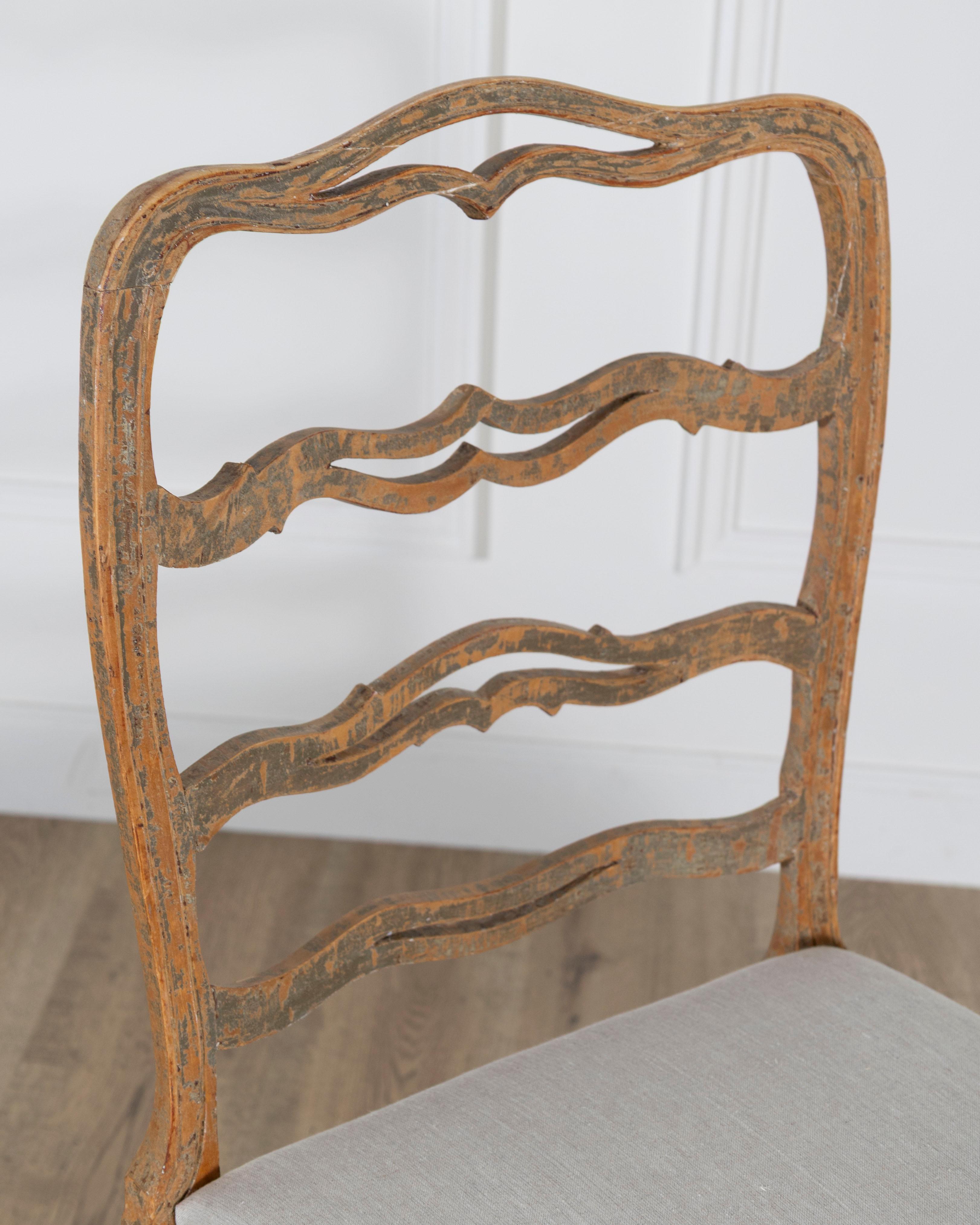 A pair of slender Gustavian chairs with smiling details Circa 1780 For Sale 2