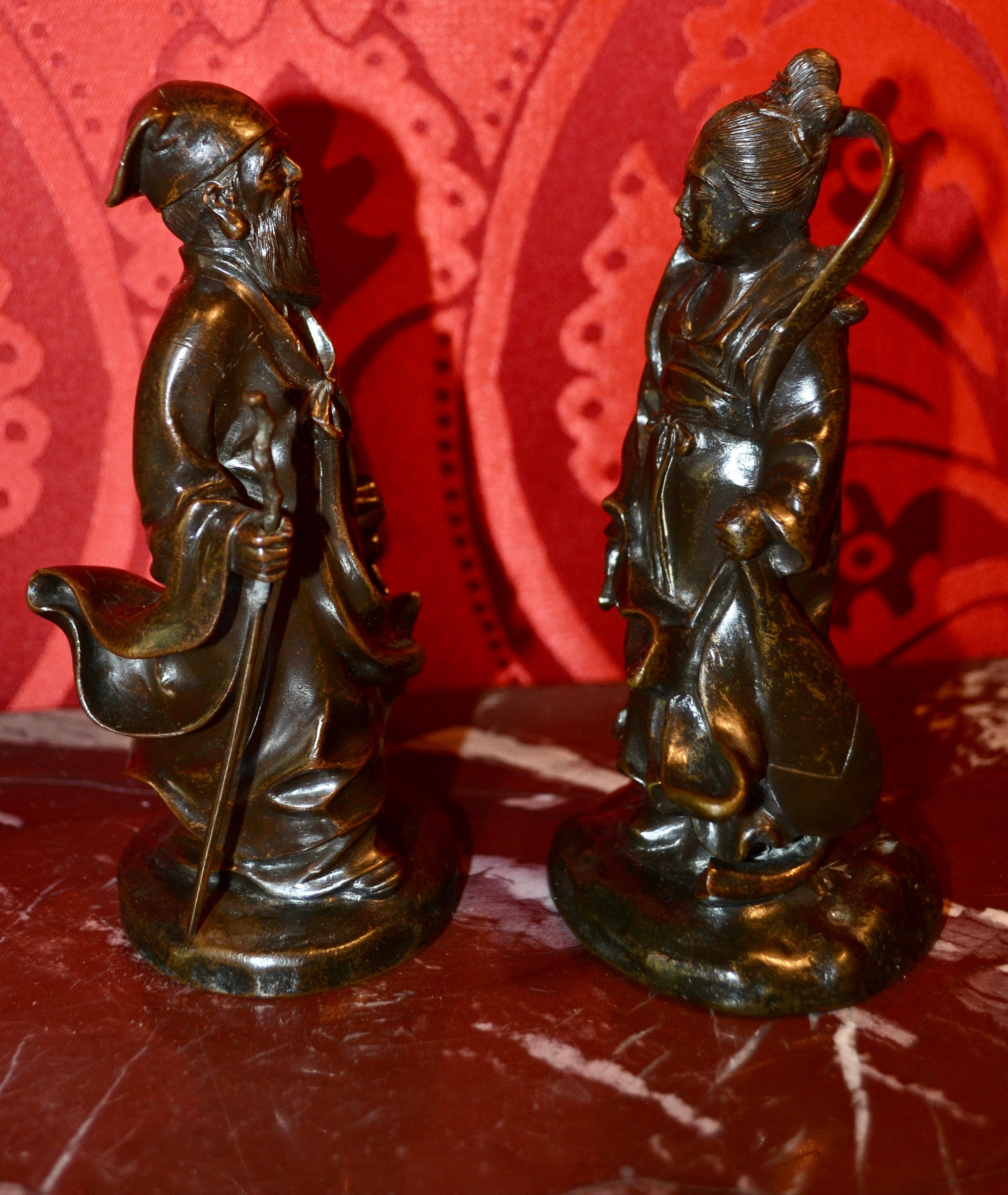 A Pair of Small 19 Century Chinese Patinated Bronze Statues of Gods or Deities   In Fair Condition For Sale In Vancouver, British Columbia