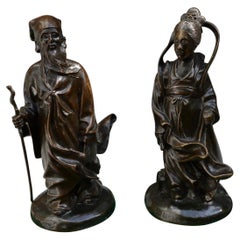 Antique A Pair of Small 19 Century Chinese Patinated Bronze Statues of Gods or Deities  