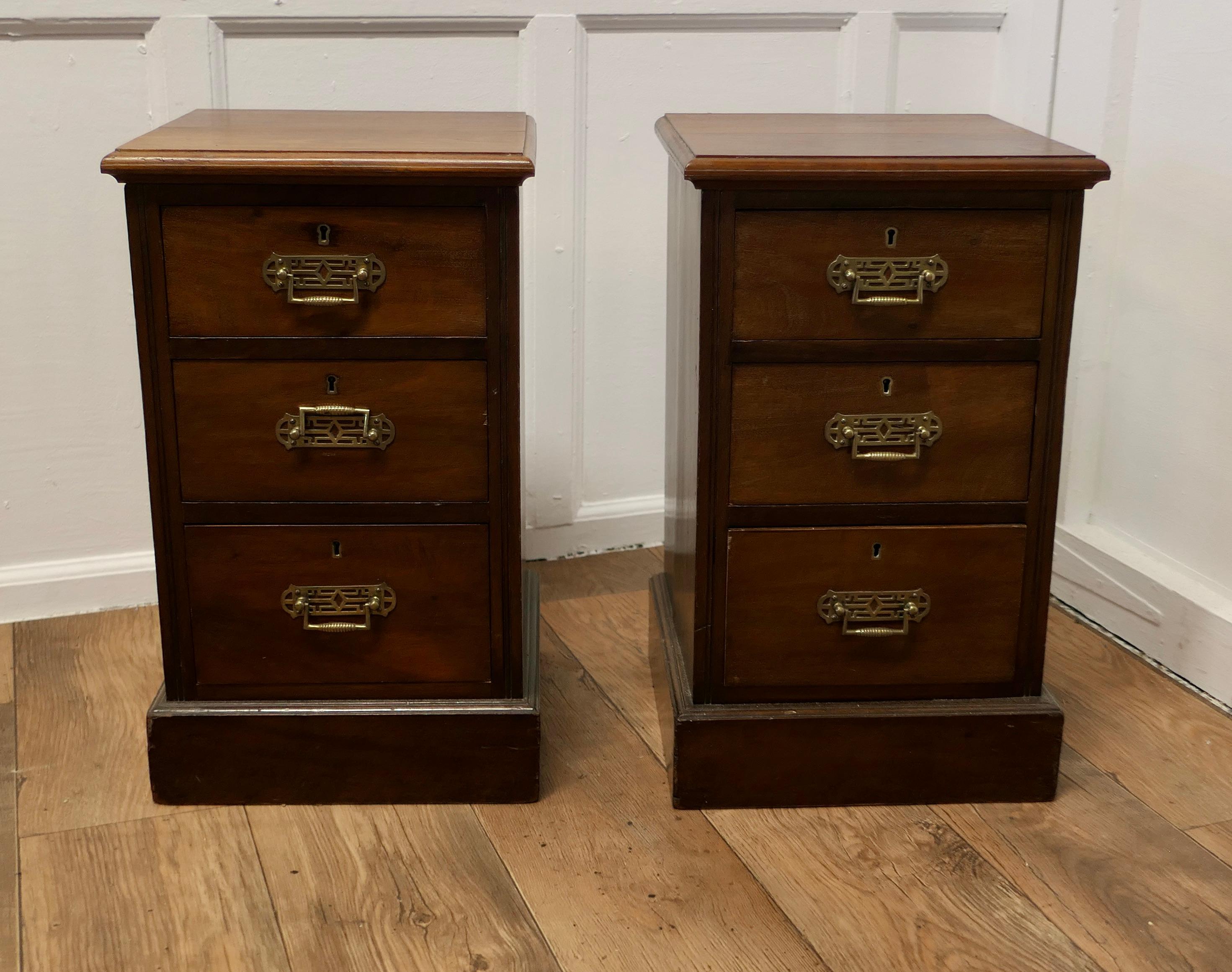A Pair of Small 4 drawer Chest of Drawers, Night Tables

These are wonderful little chests, they each have 4 drawers and brass handles
The drawers run very smoothly and they each stand on a small plinth with an attractive moulded edge to the top