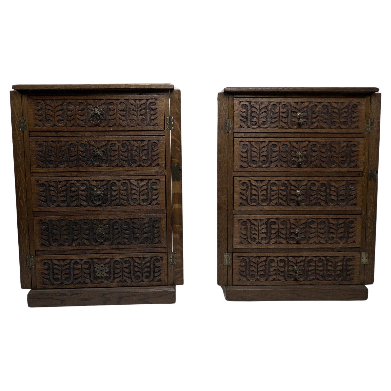 A pair of small Aesthetic Movement oak sets of drawers with lockable side flaps. For Sale