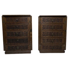 A pair of small Aesthetic Movement oak sets of drawers with lockable side flaps.