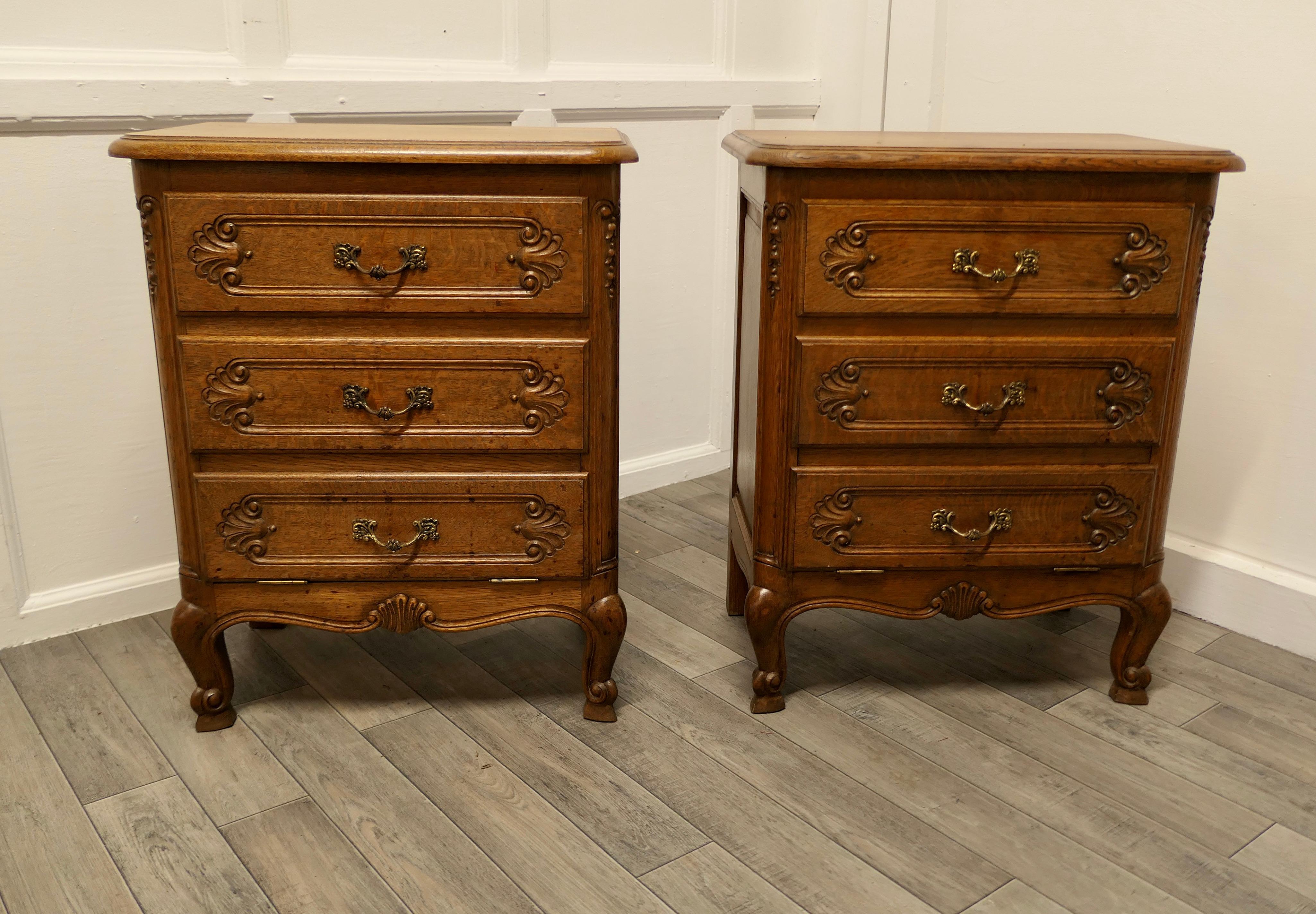 A Pair of Small French Golden Oak Chests of Drawers

These are wonderful little chests, they appear to have 3 drawers to the front, the bottom 2 drawer fronts have a combined fall front they all have brass ormolu handles and are carved in the French