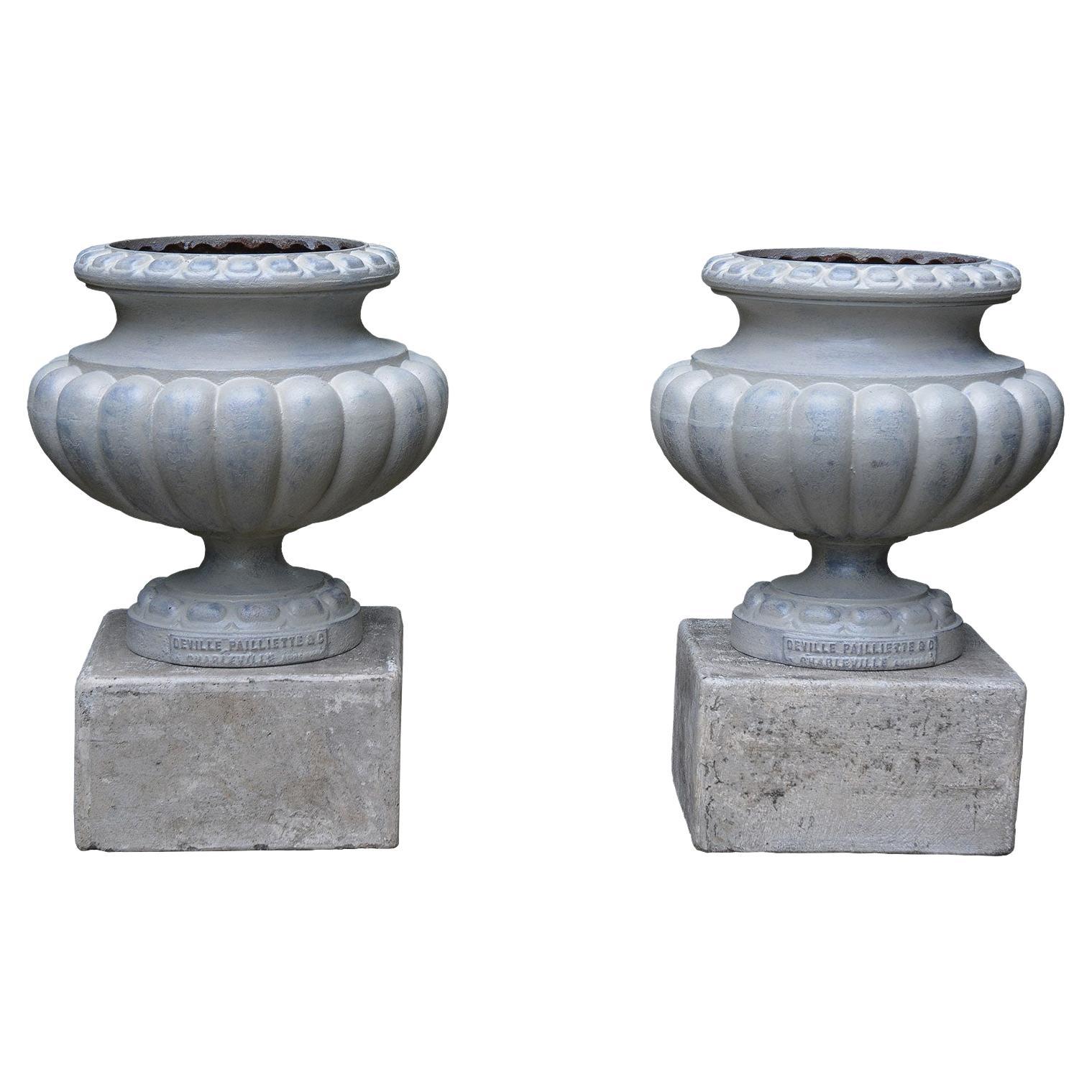 Pair of Small Steel Grey Cast-Iron Urns For Sale