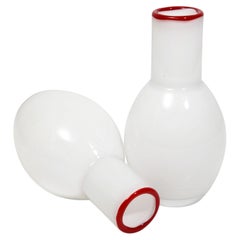 A pair of small white opal-coloured blown glass vases from Denmark