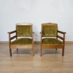 Una coppia di poltrone Arts & Crafts in rovere massiccio