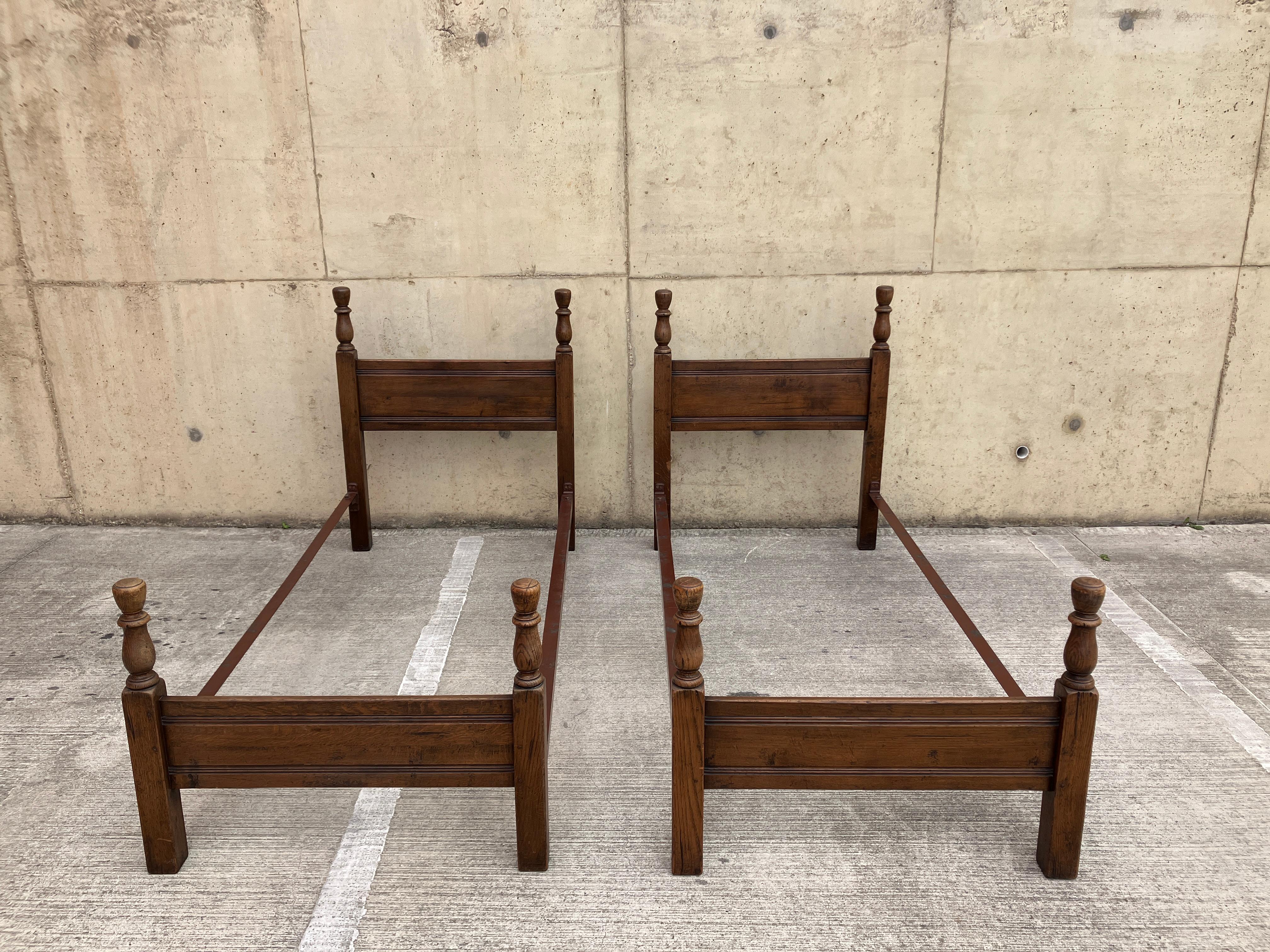 Mid-20th Century A Pair of Solid Oak Single Beds Early 20th Century For Sale