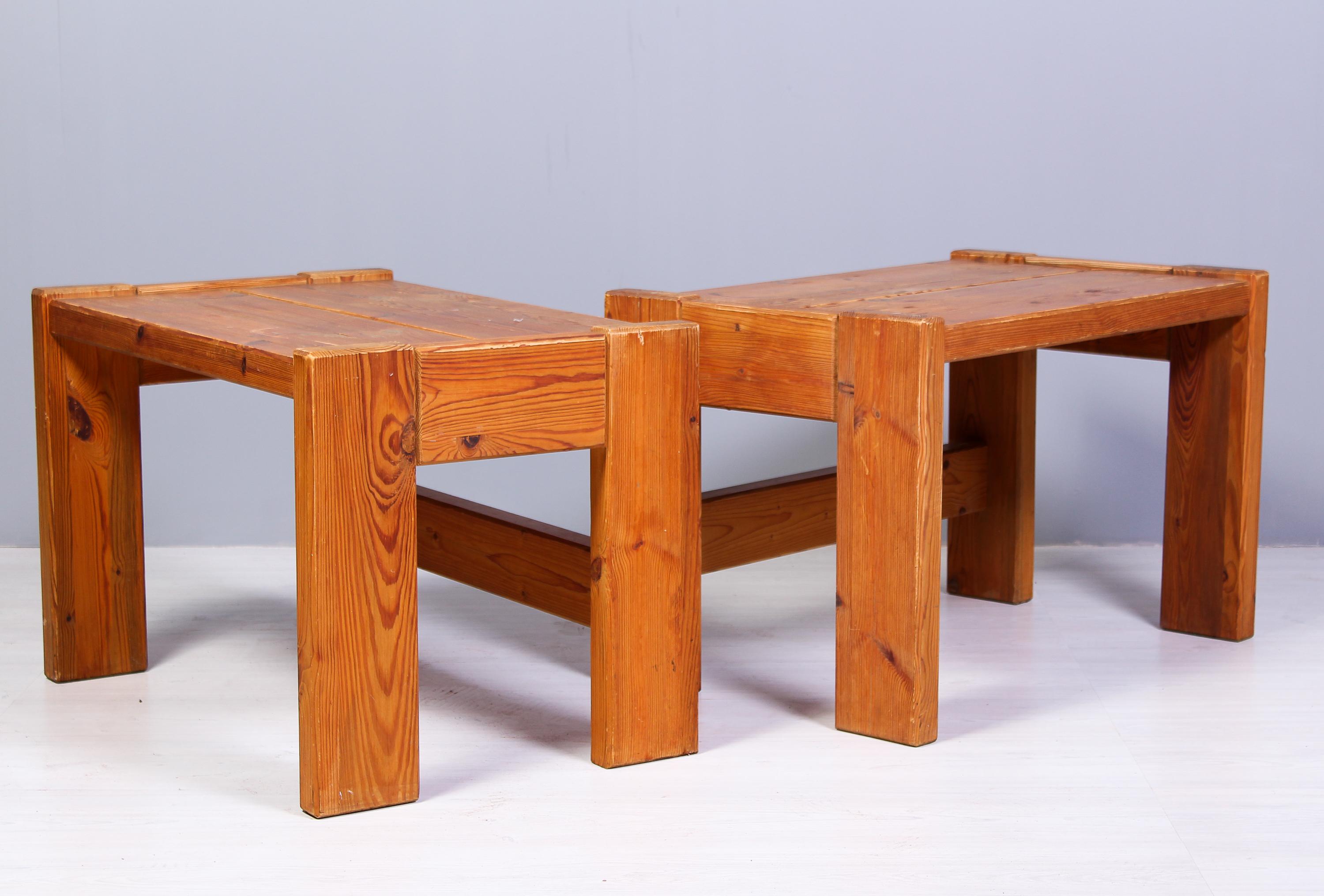 A pair of solid pine side tables that can be used as tables, nightstands or benches. The size gives the pieces a functionality that can be used in many places. The condition is good with signs of usage and patina but no structural damages.