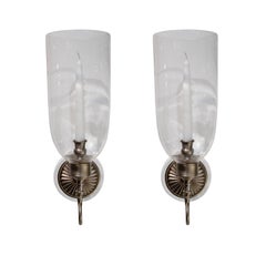 A Pair of Solis Sconces with Clear Hurricane Shades