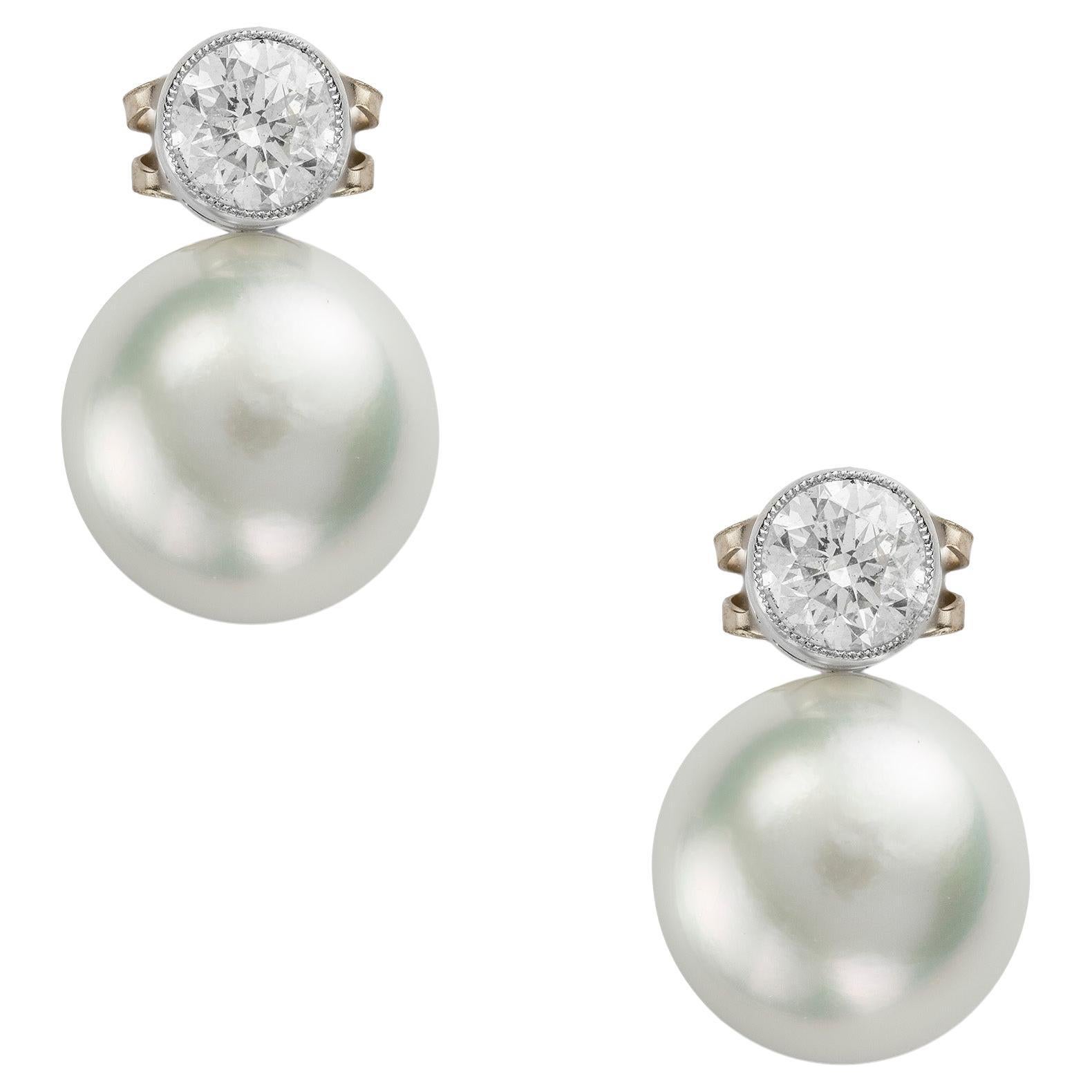 A Pair Of South Sea Cultured Pearl And Diamond Earrings For Sale