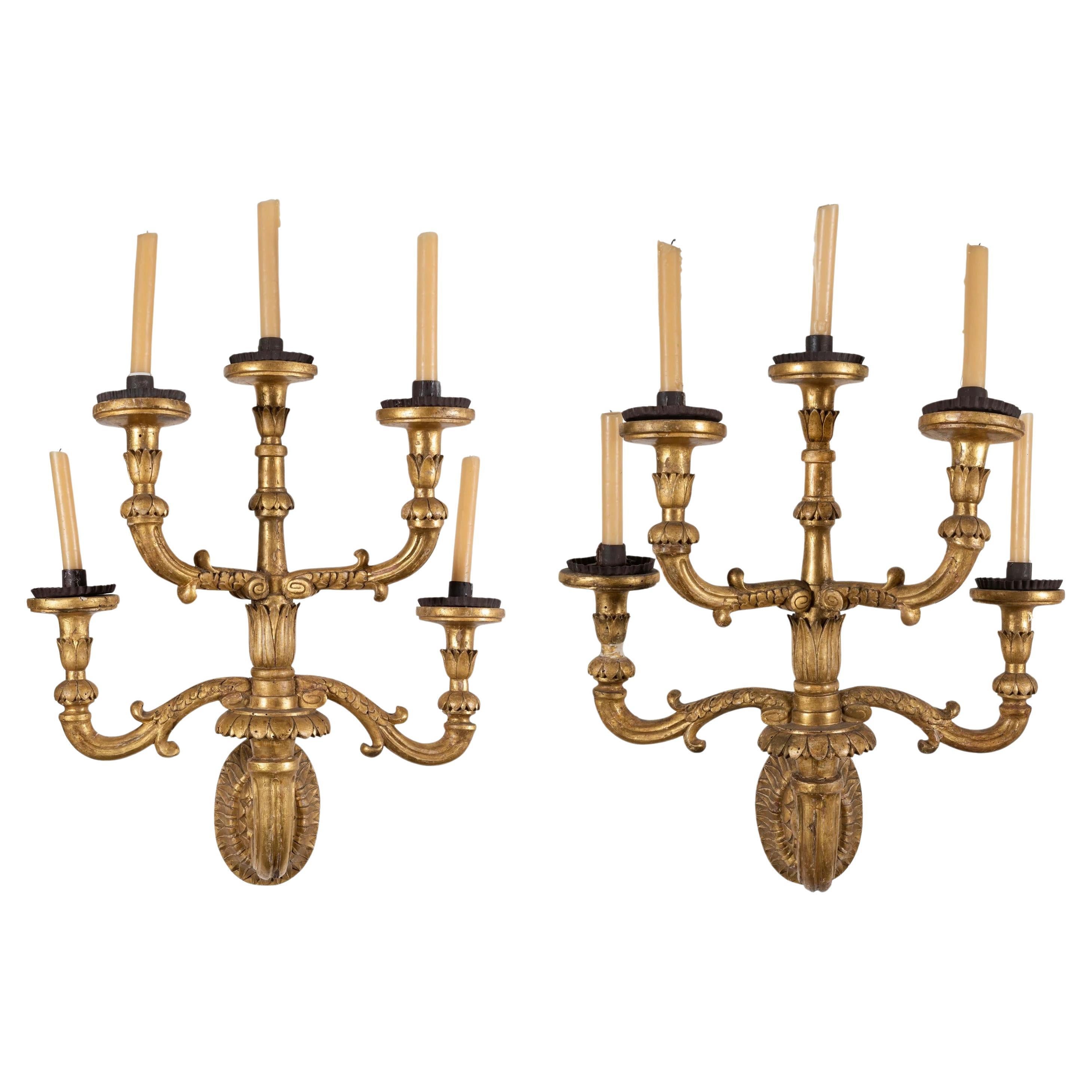 A Pair of Spanish Carlos II Carved Giltwood Wall Sconces, 17th Century