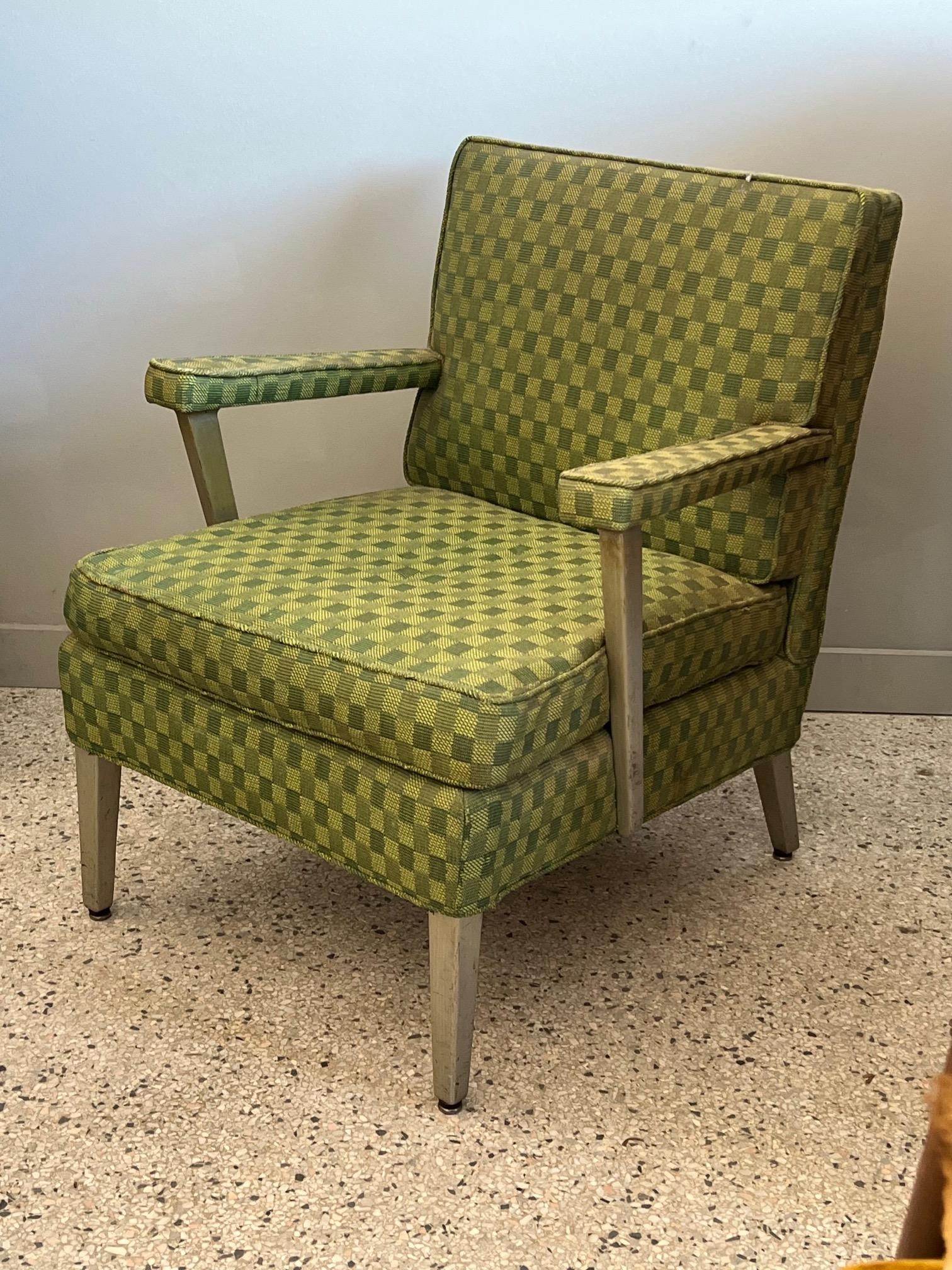 A pair of rare, first class cabin low armchairs from the famed ocean liner SS United States. Retaining original checkered green upholstery, heavy aluminum legs. There is a small number of these chairs left. 