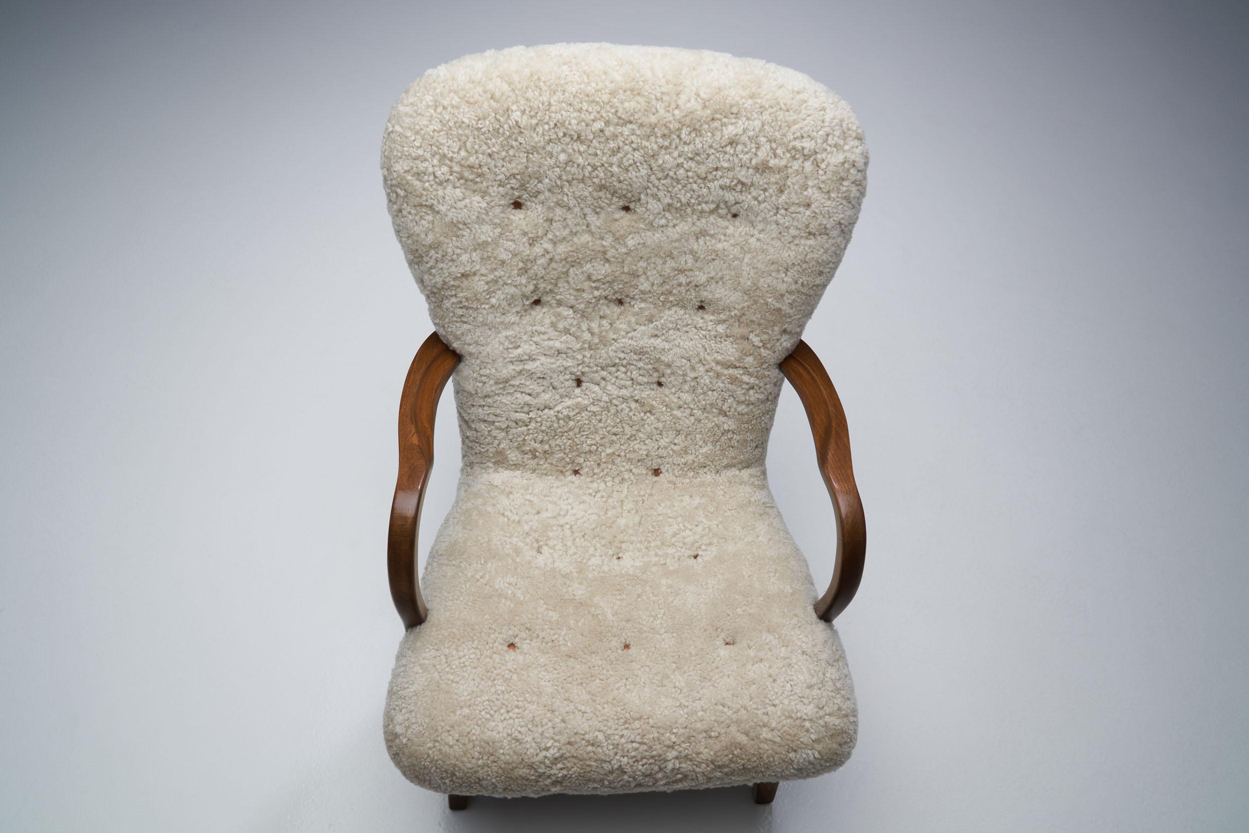 Sheepskin Pair of Stained Beech Easy Chairs by a Danish Cabinetmaker, Denmark, 1940s