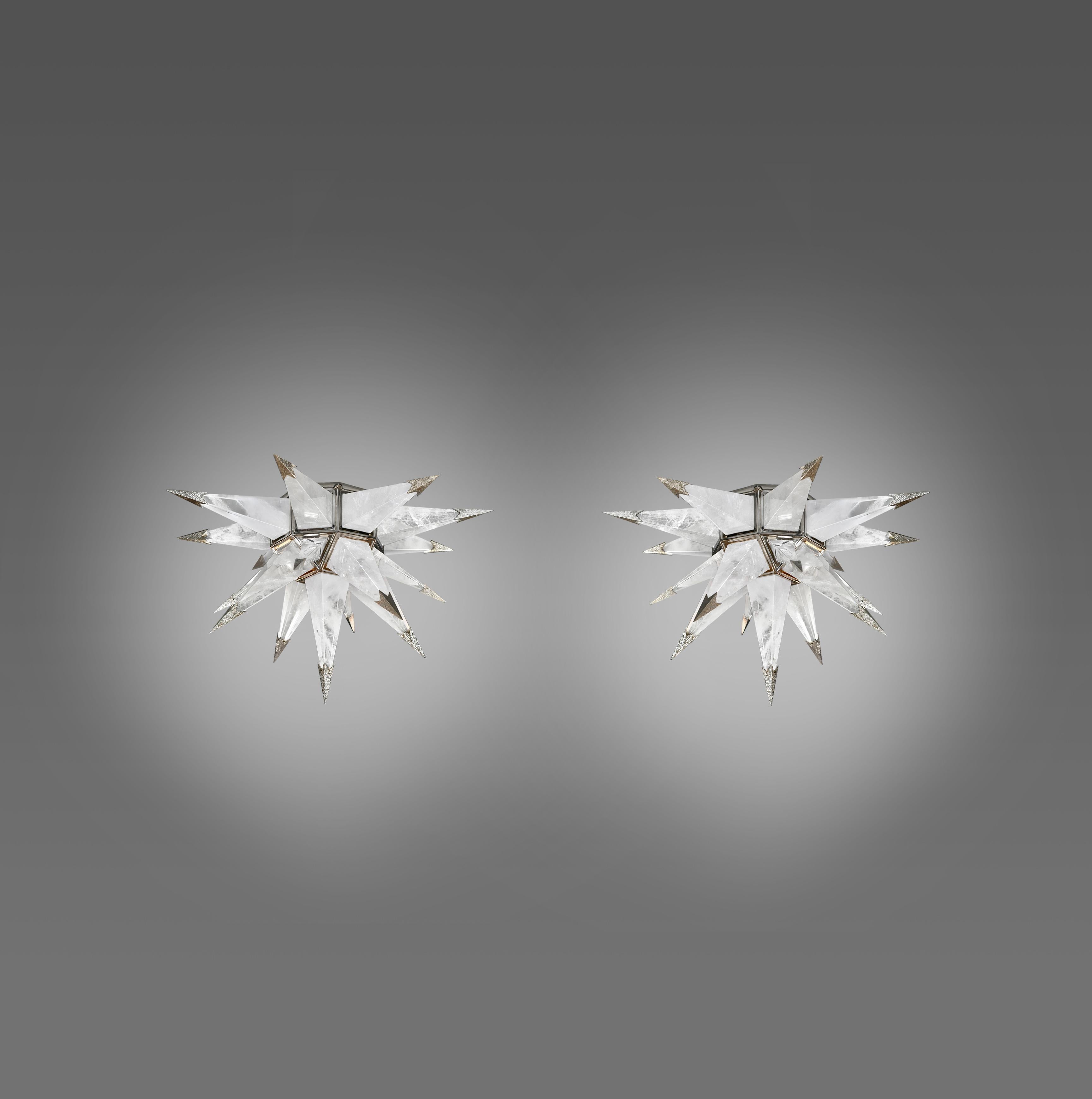A pair of star form rock crystal flush mounts with nickel plating frame and tip. Created by Phoenix Gallery, NYC.
Each flush mount installs two sockets, uses 2 candelabra lightbulbs. 60w each, 120w in total.