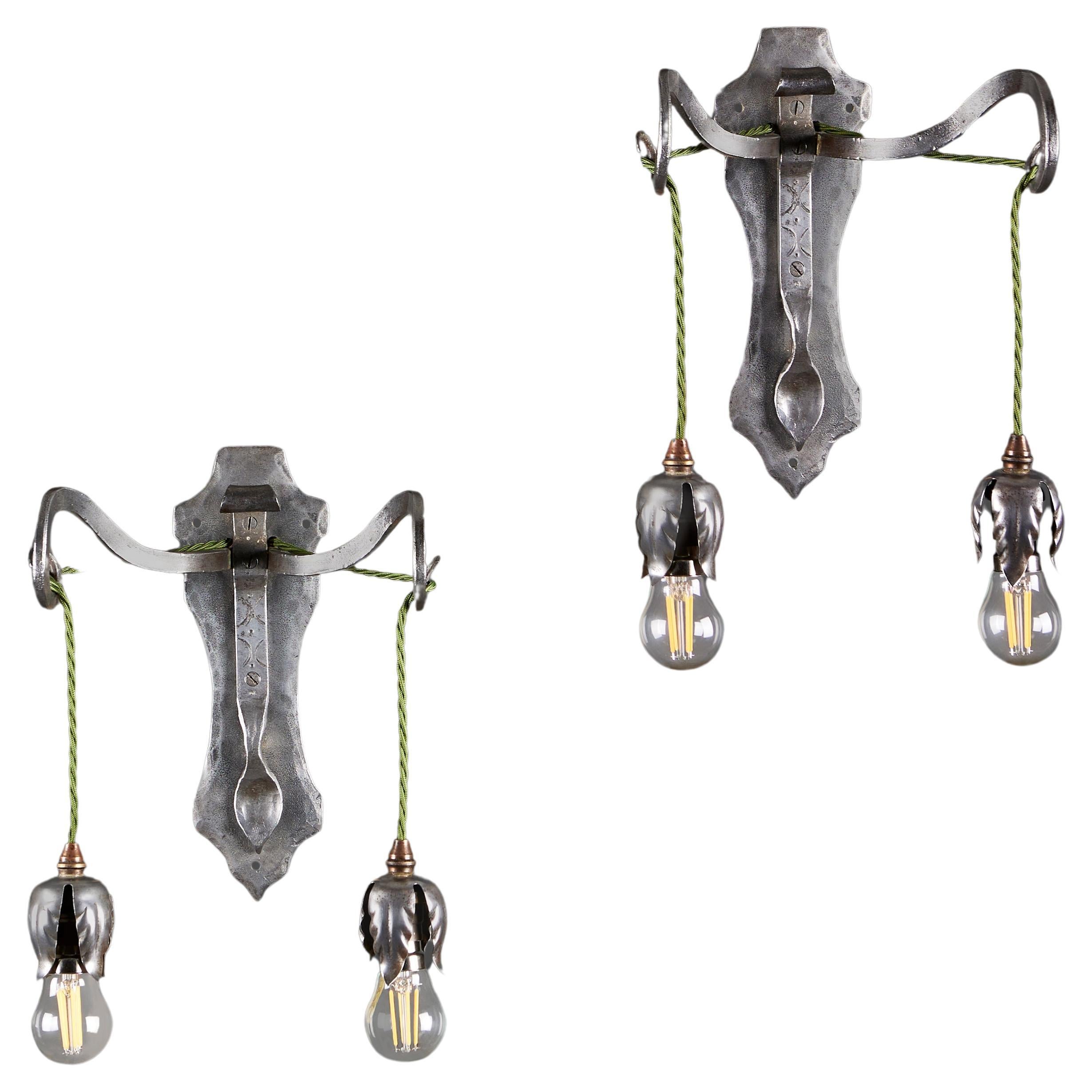 A Pair of Steel Arts and Crafts Wall Lights