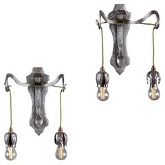 A Pair of Steel Arts and Crafts Wall Lights