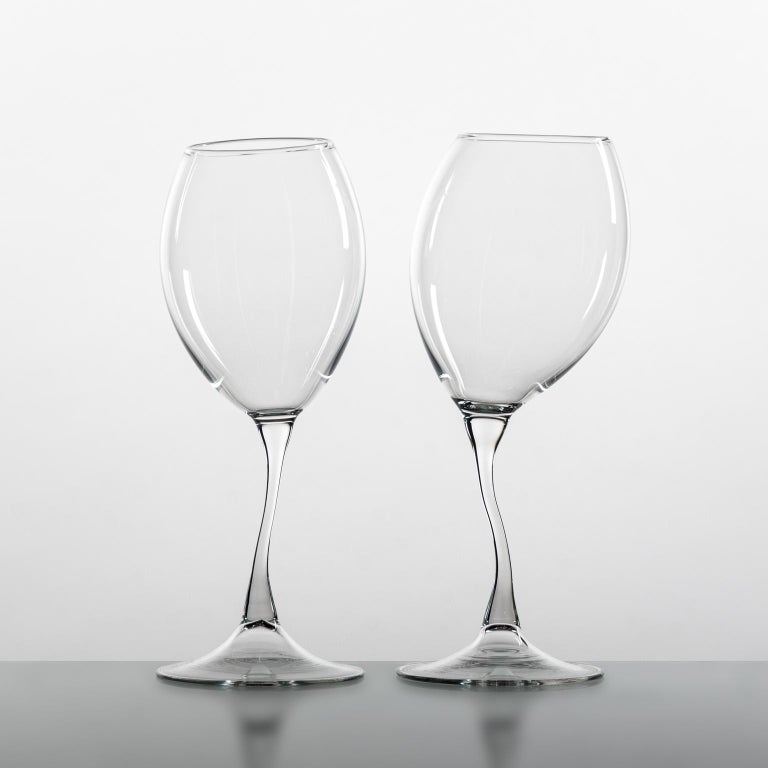 'Pair of Storti Wine Glasses'
A Pair of Hand Blown Wine Glasses by Simone Crestani.

'Storti Wine Glass is one of the pieces from the Storti Collection.'

'Storti', like in a kid's drawing, lines are not forced to go straight and be perfect. I