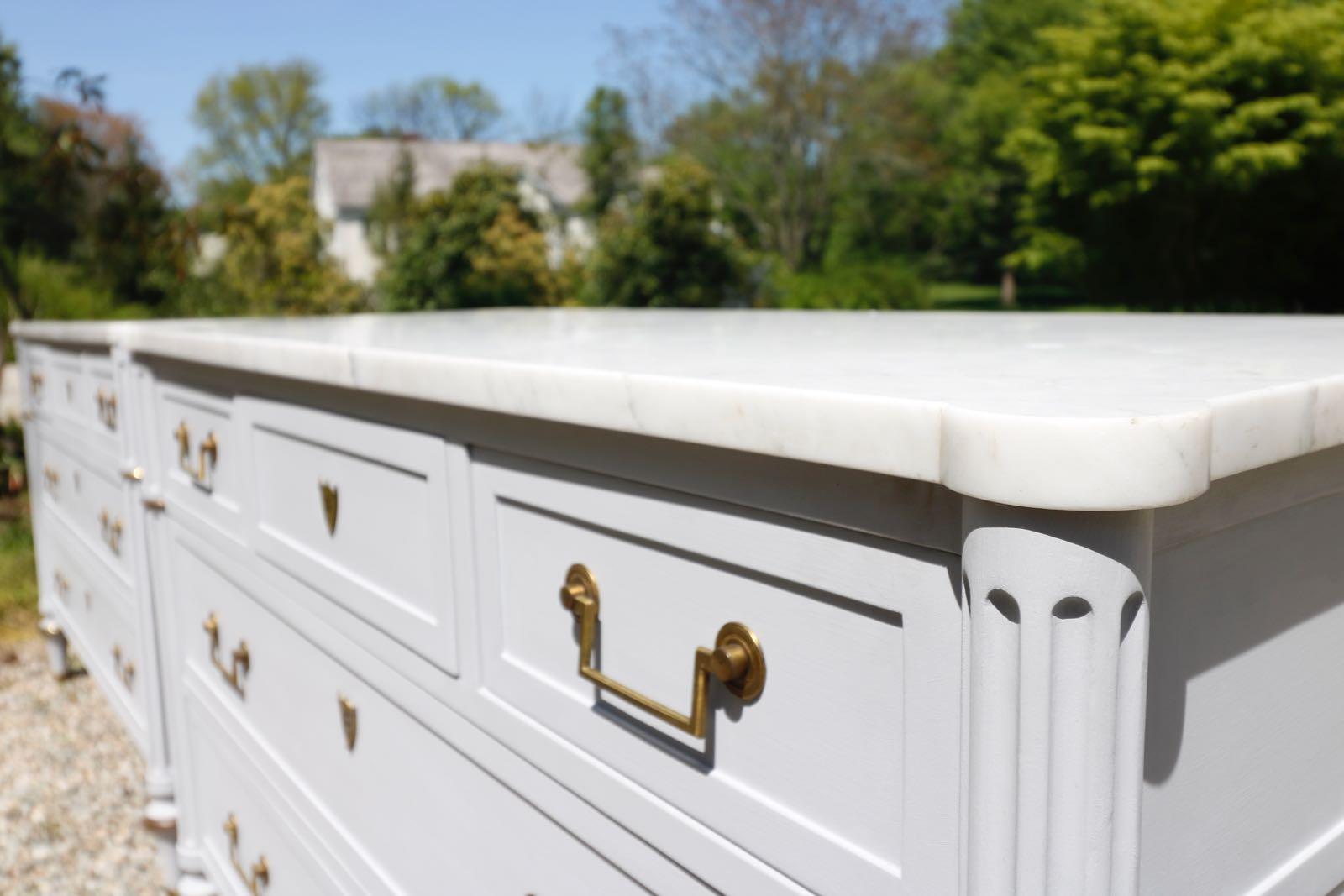 A pair of stunning painted baker commodes - Chicago gray with Carrara white marble top. Stunning white Carrara marble top and brass hardware. Stunning! Phenomenal beauty - dovetailed drawers, brass hardware, white marble tops. Classic beauties. Key