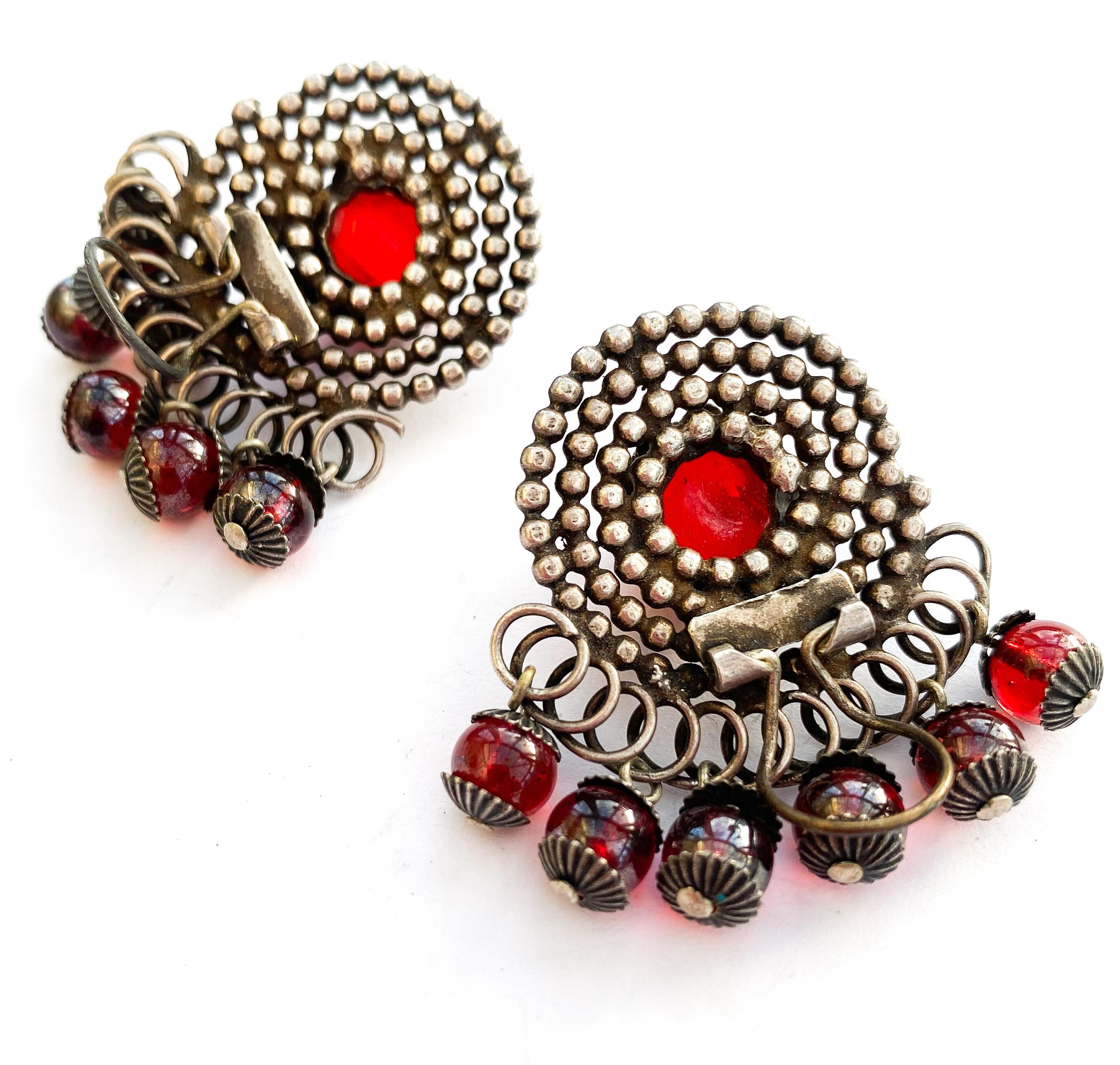 A pair of stylised silvered metal and red glass 'swirl' earrings, France, 1950s For Sale 4