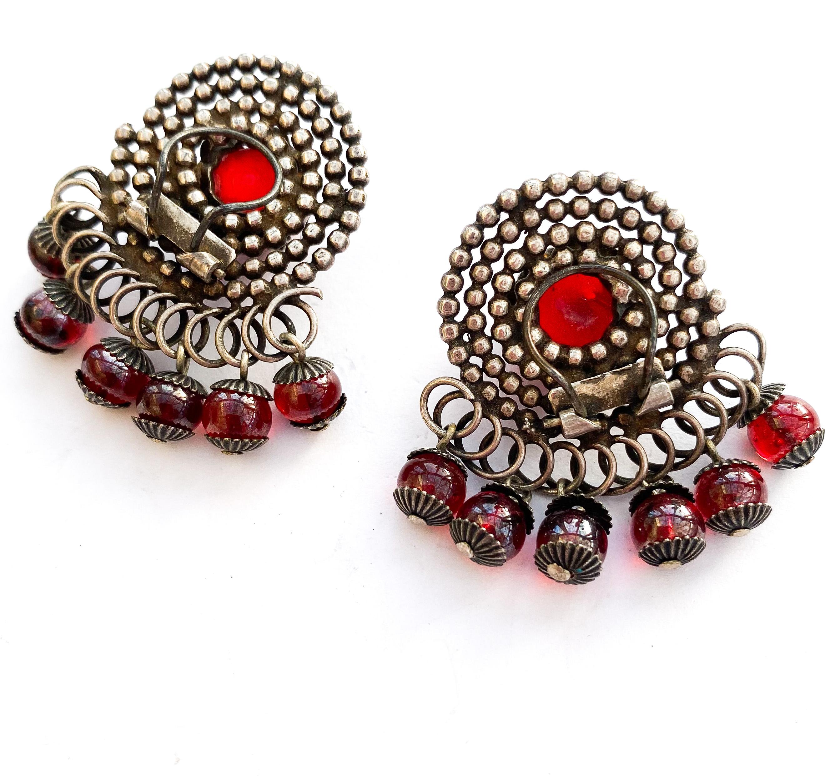 A pair of stylised silvered metal and red glass 'swirl' earrings, France, 1950s For Sale 5