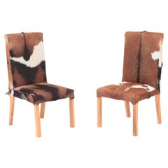 Pair of Stylish Wood Side Chairs Upholstered in Genuine Cowhide