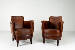 A Pair of Submarine Sheep Leather Chairs