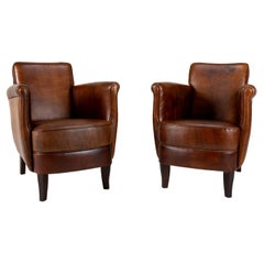 A Pair of Submarine Sheep Leather Chairs