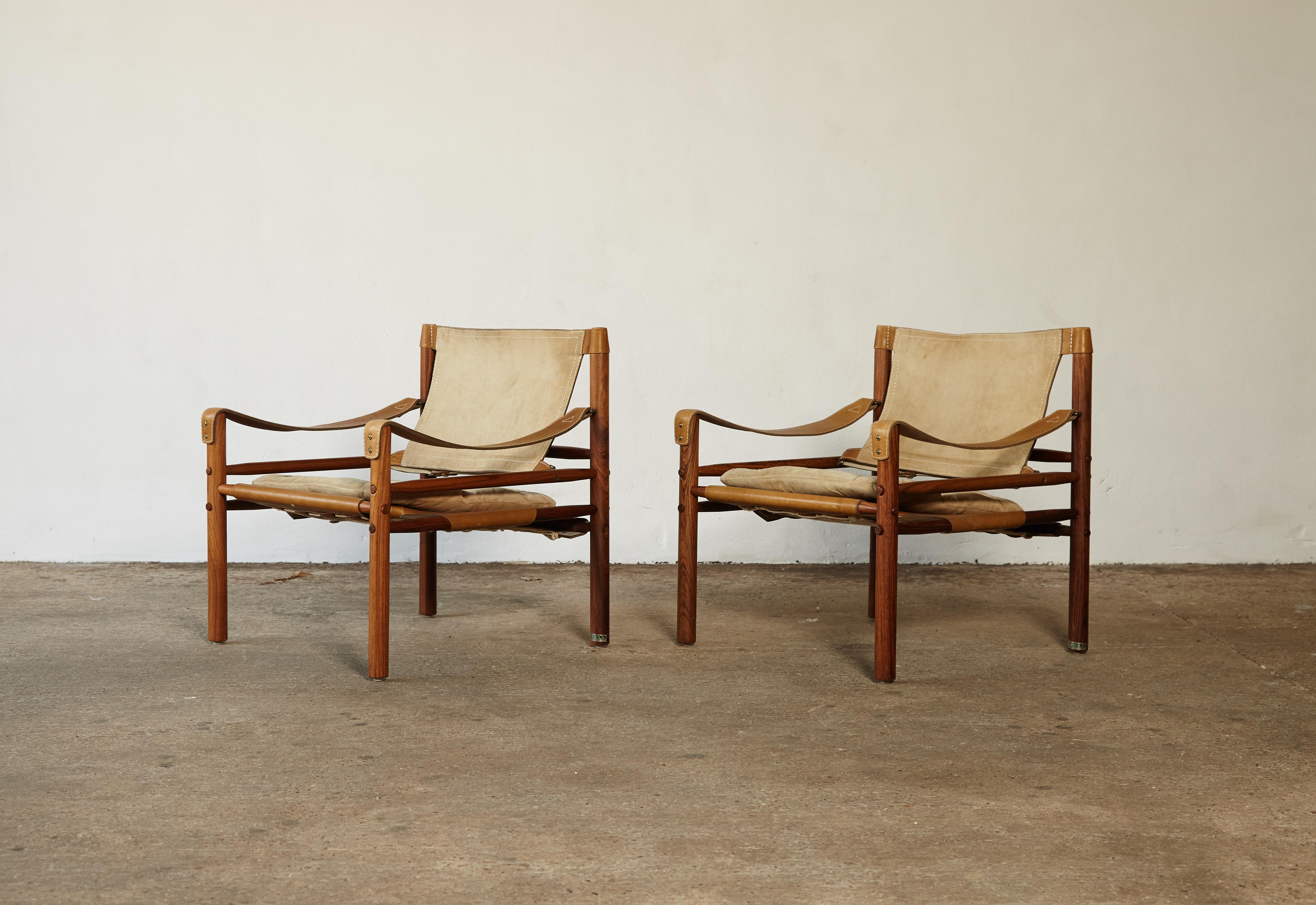 A lovely pair of vintage Arne Norell safari sirocco chairs in very rare suede and rosewood. Made by Norell Mobler in Sweden. Lovely condition. 


The chairs will need to be disassembled for shipping but were designed to be taken apart and put