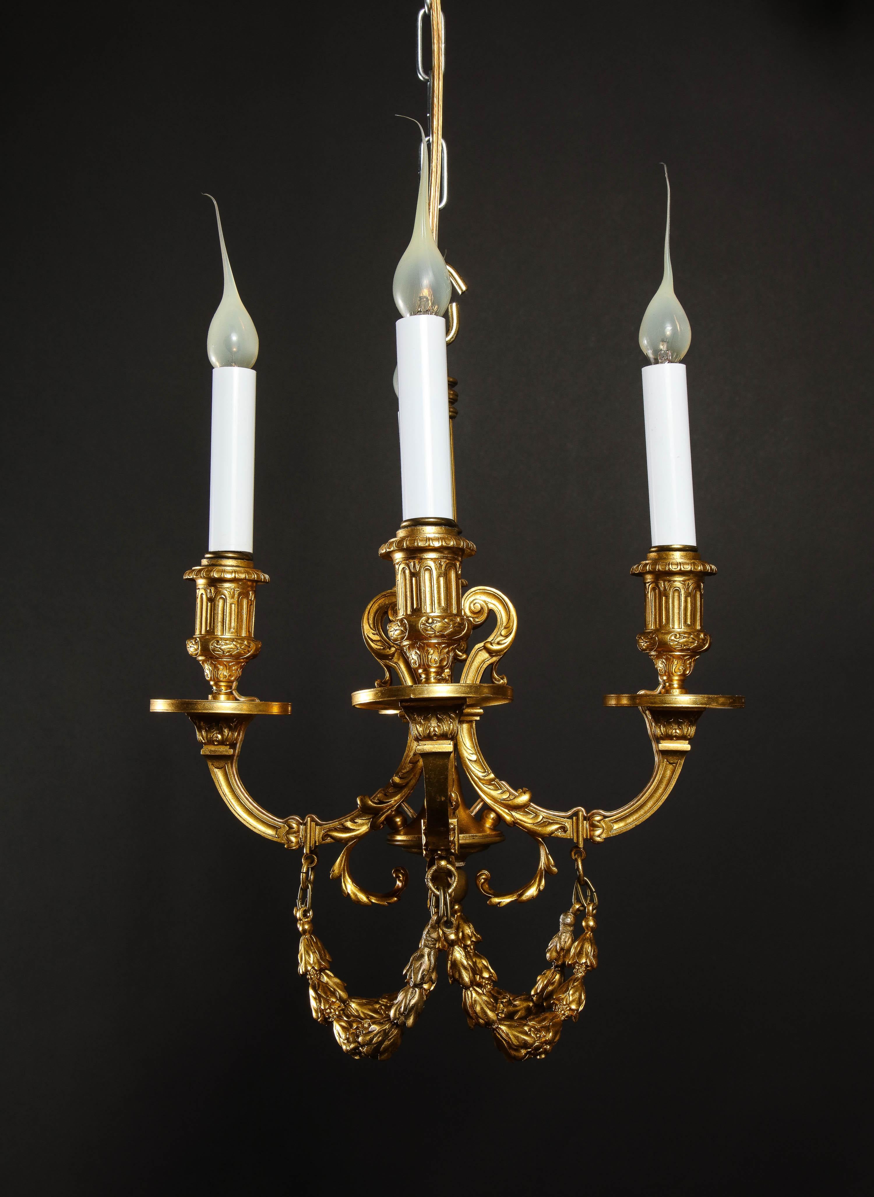 A Pair of Superb Antique Louis XVI Style Gilt Bronze Chandeliers For Sale 6
