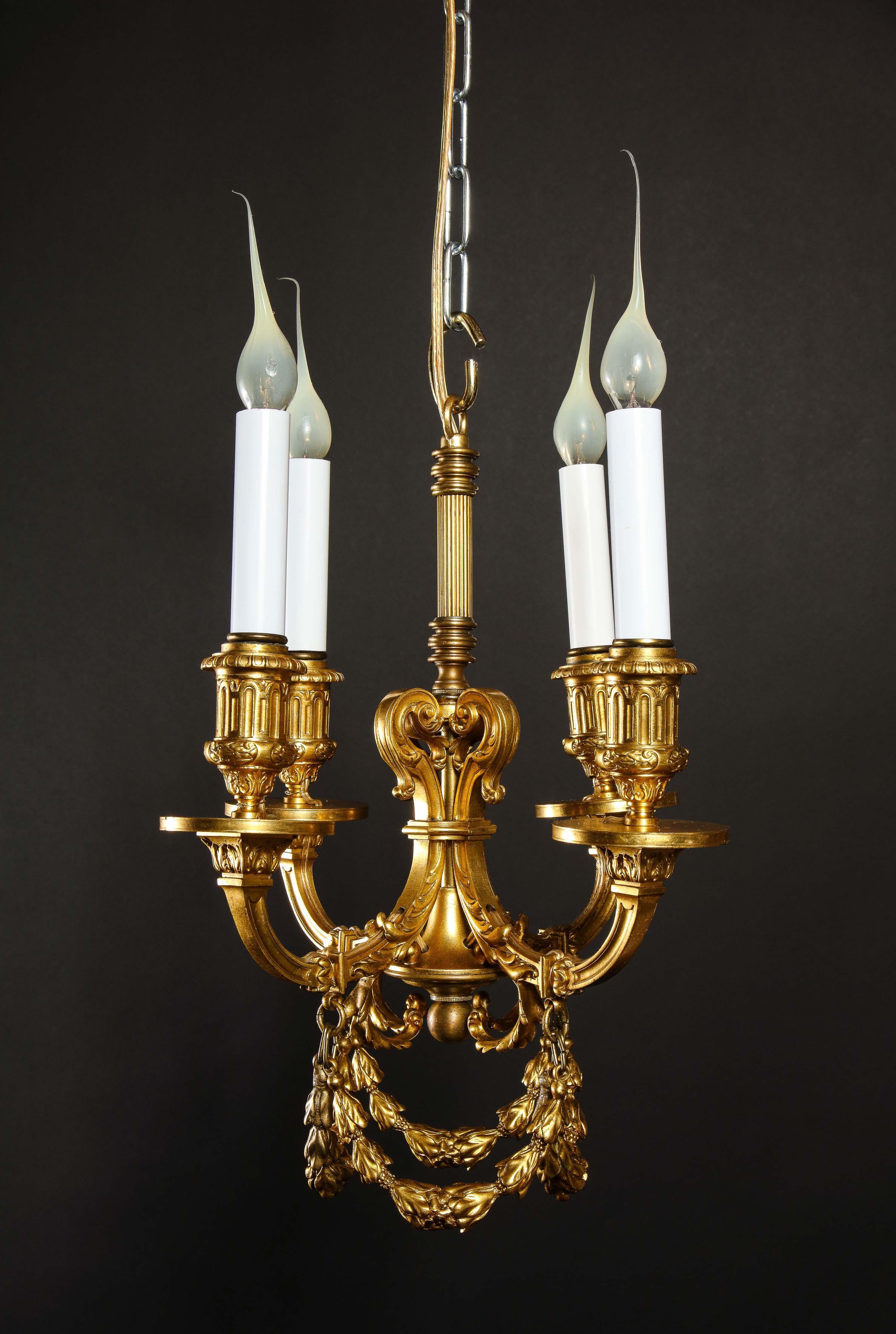 A Pair of Superb Antique Louis XVI Style Gilt Bronze Chandeliers In Good Condition For Sale In New York, NY