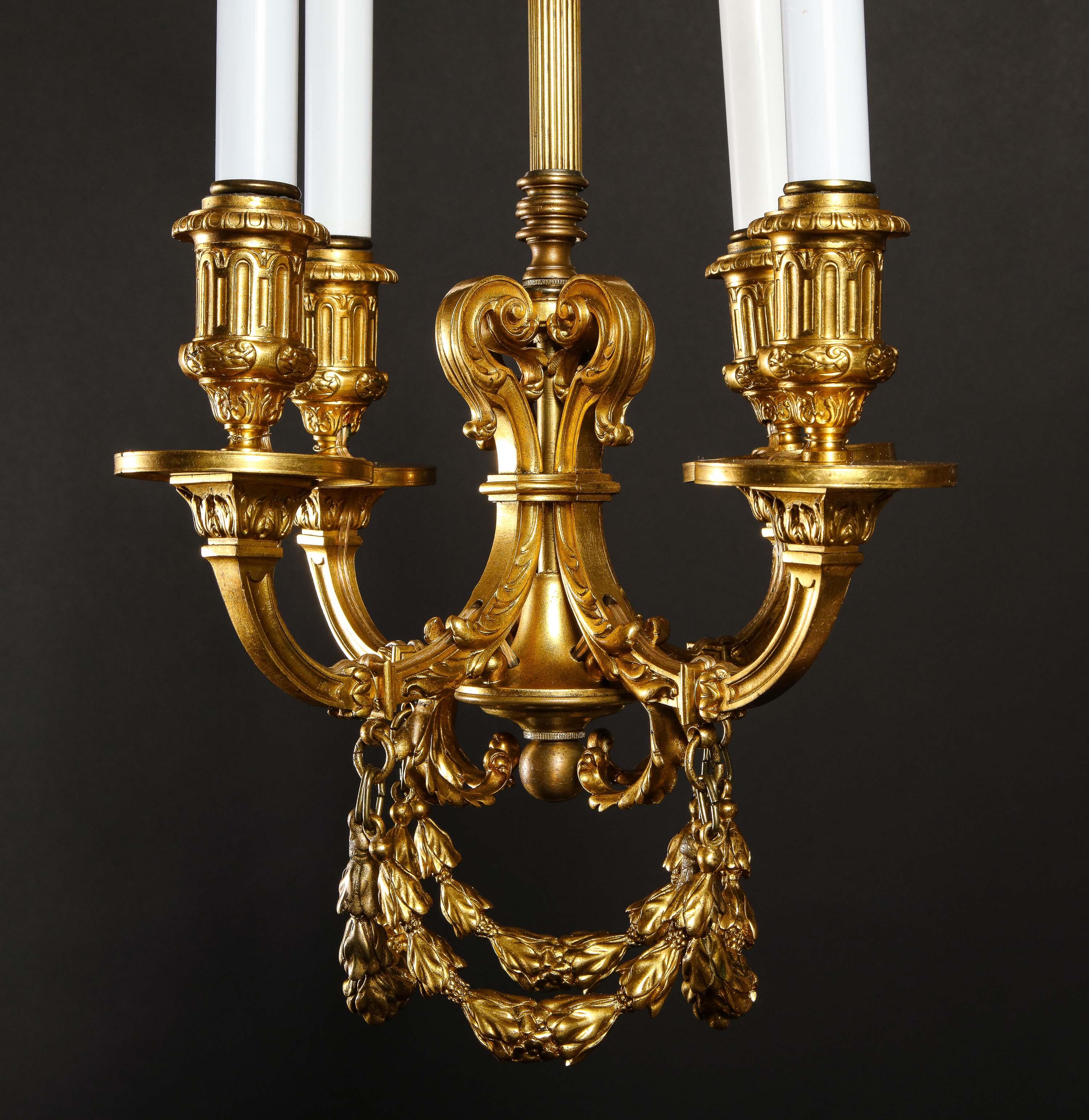 20th Century A Pair of Superb Antique Louis XVI Style Gilt Bronze Chandeliers For Sale