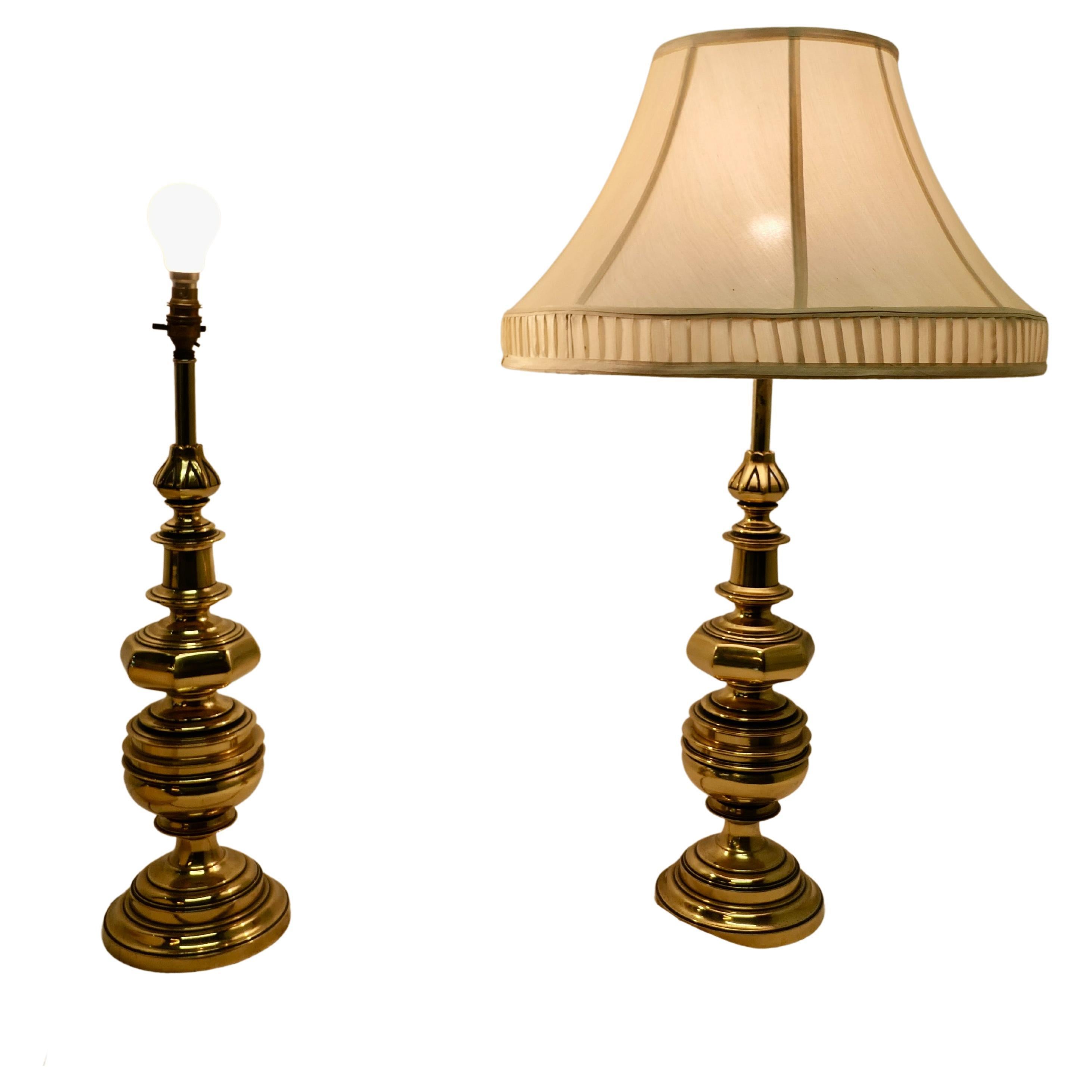 A Pair of Superb Quality Large Bulbous Brass Table Lamps 

This is a very large pair of brass lamps, I have shown them with lampshades but these are somewhat worn now but it gives you the IDEA of how they look with shades 
The lamp is fully wired
