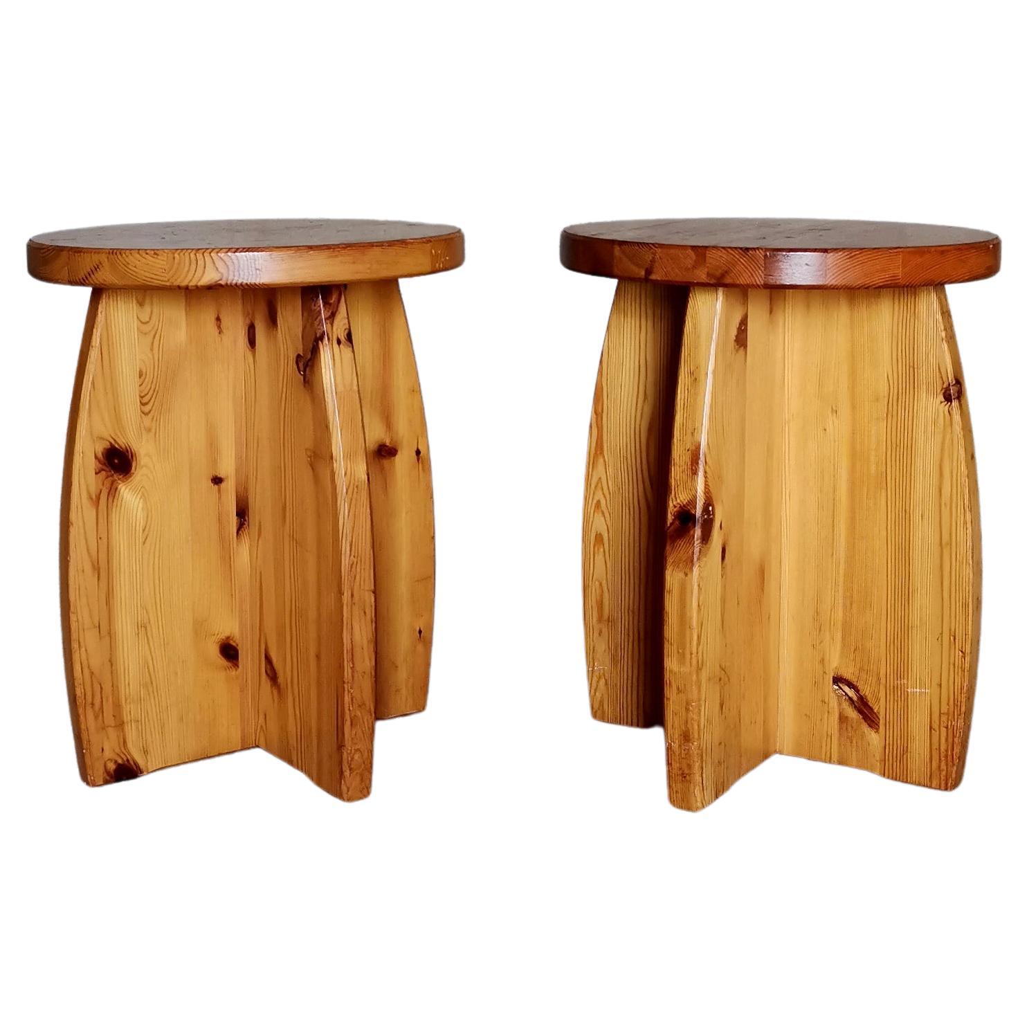 A pair of Swedish 1970s solid pine stools/side tables, Les Arcs like patina. For Sale
