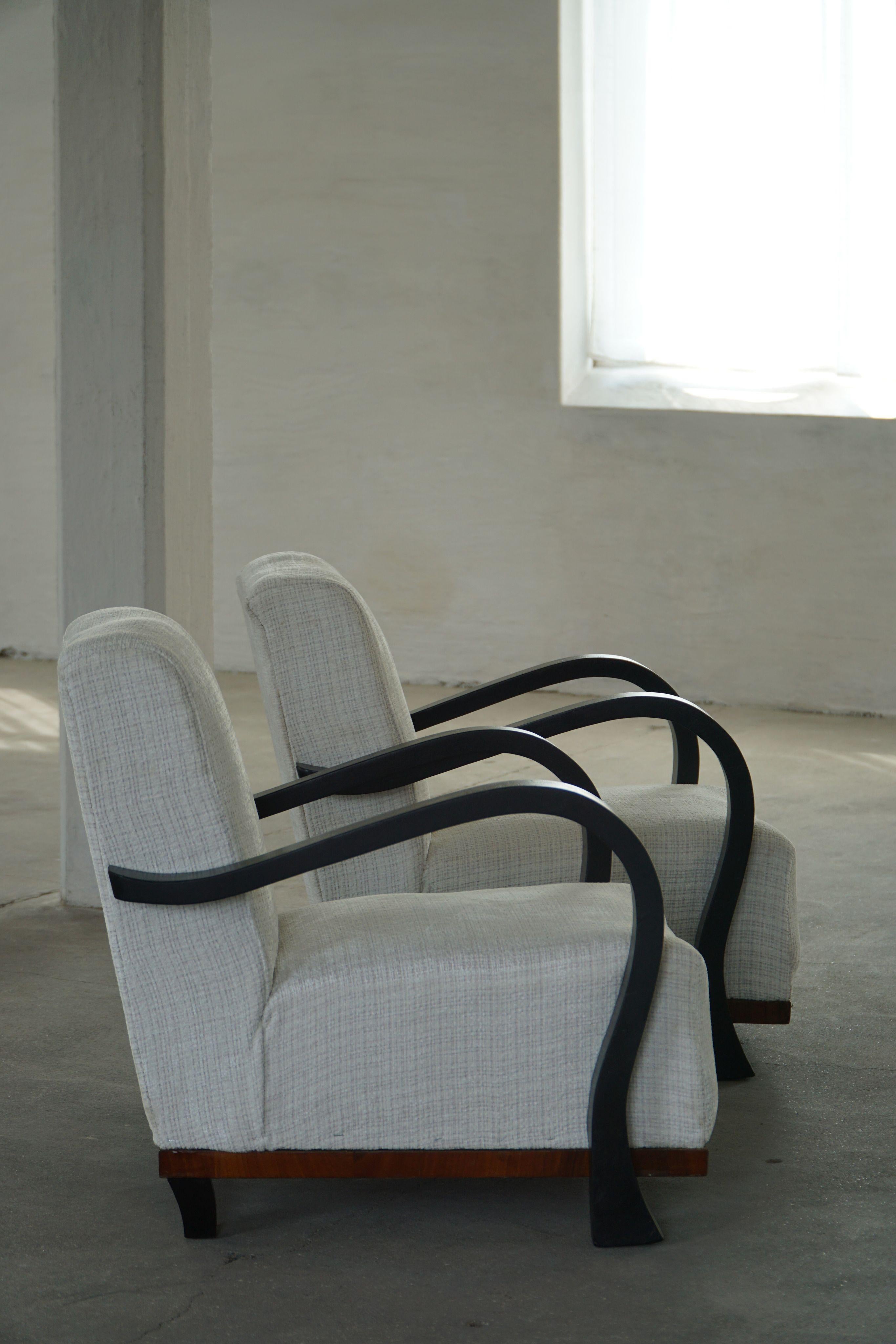 20th Century A Pair of Swedish Art Deco Lounge Chairs with Curved Armrests, 1930s For Sale