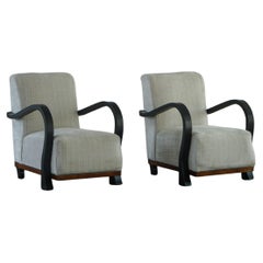 A Pair of Swedish Art Deco Lounge Chairs with Curved Armrests, 1930s