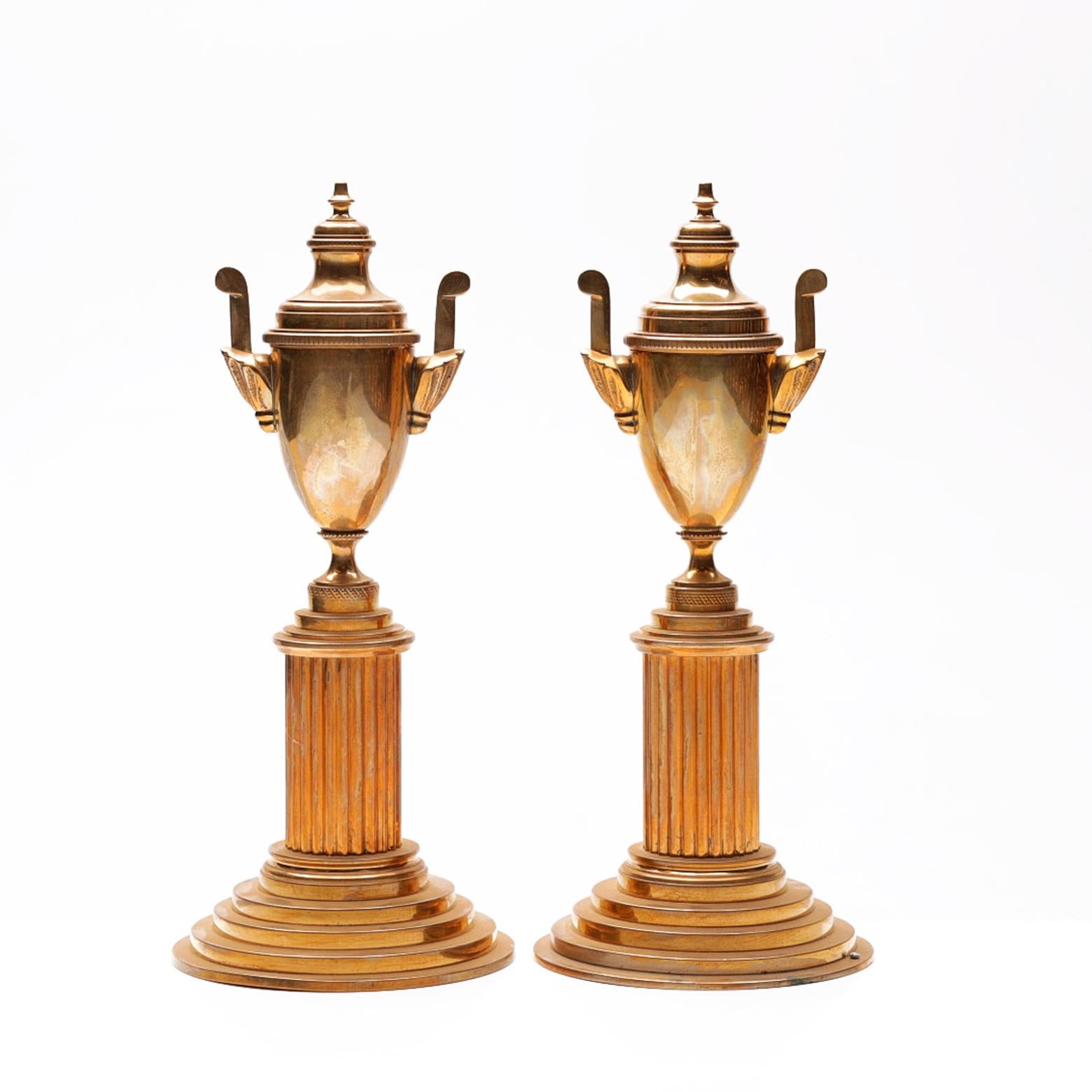 A pair of Swedish brass Cassolettes made in Skultuna, 1900-century. (number_60A) The tops can be screwed of, so that they can either be used as candlesticks or decorative objects depicting a urn on a pillar. Good quality on the casting.