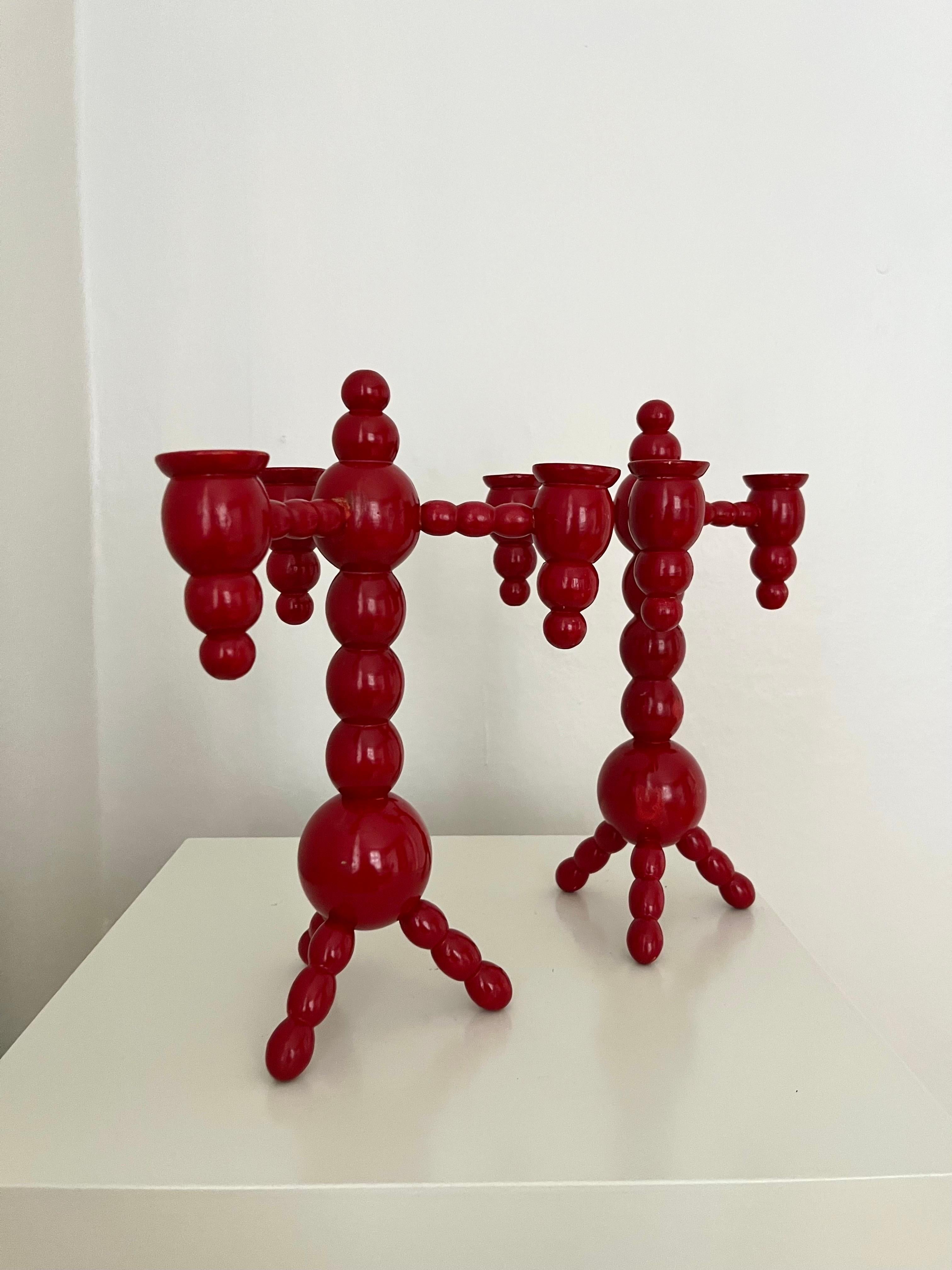 Painted A pair of Swedish Christmas candelabras red painted wood bobbin 1970s  For Sale