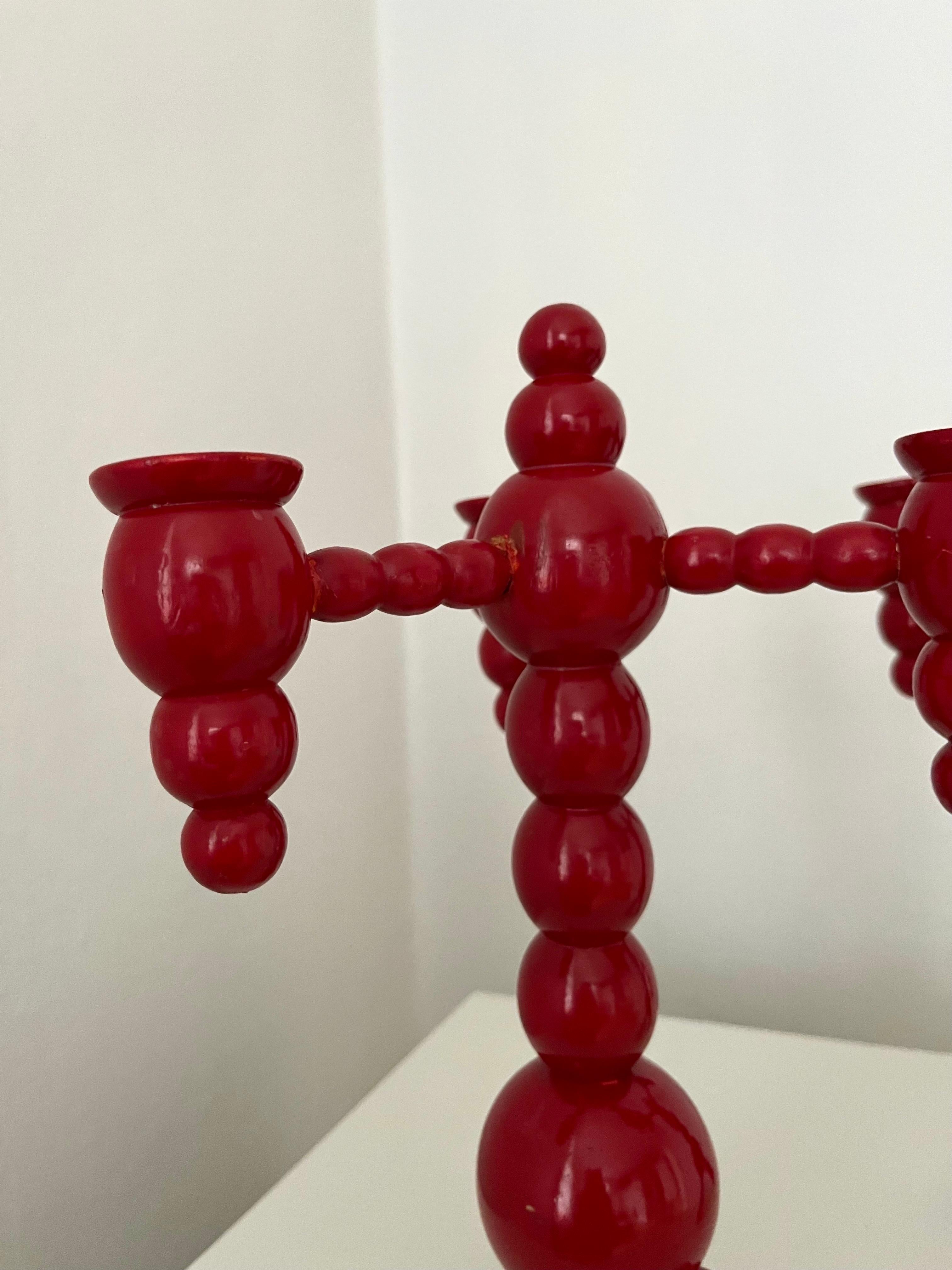 Wood A pair of Swedish Christmas candelabras red painted wood bobbin 1970s  For Sale