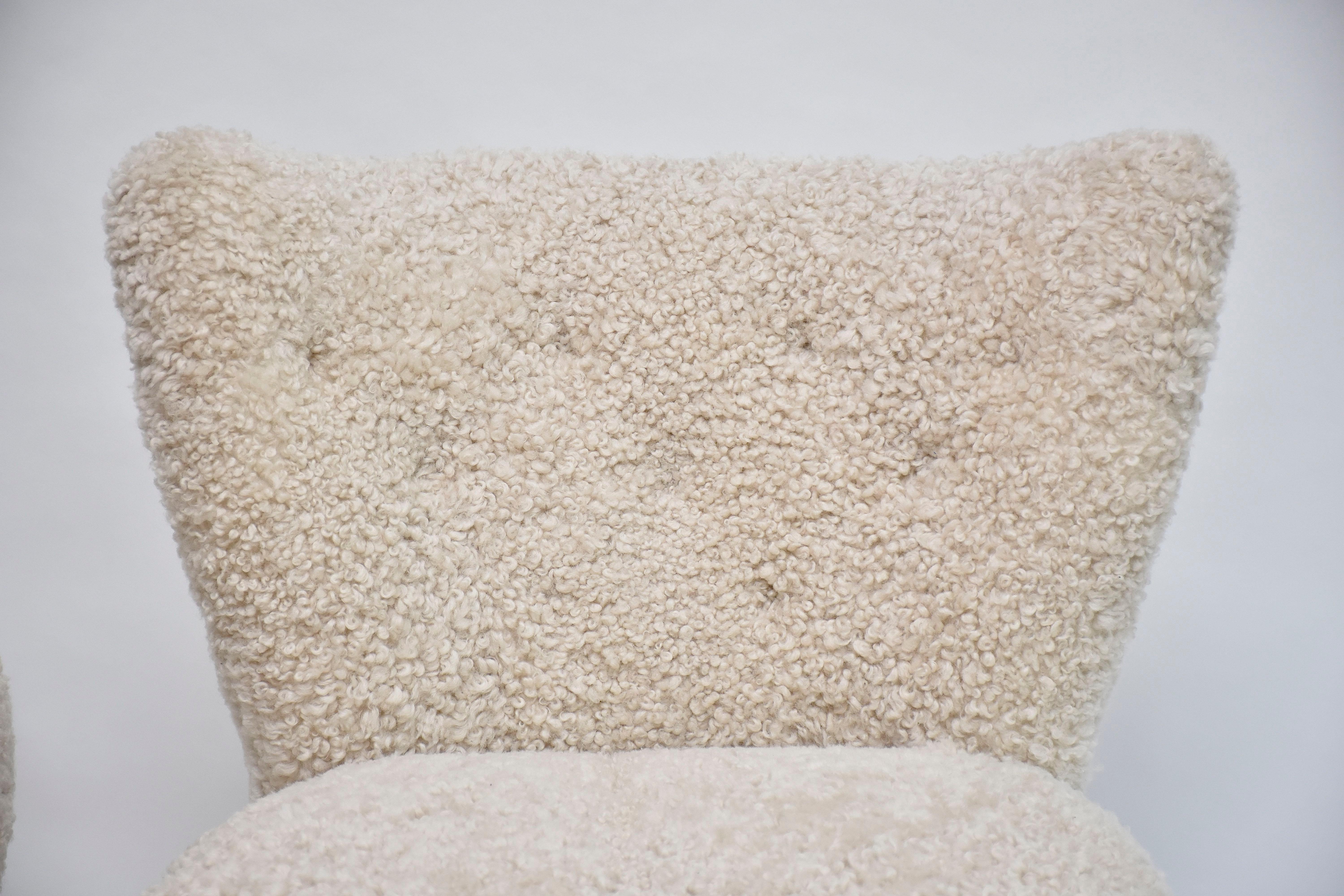A pair of Swedish coctail / lounge armchairs in sheepskin, ca. 1940 For Sale 1