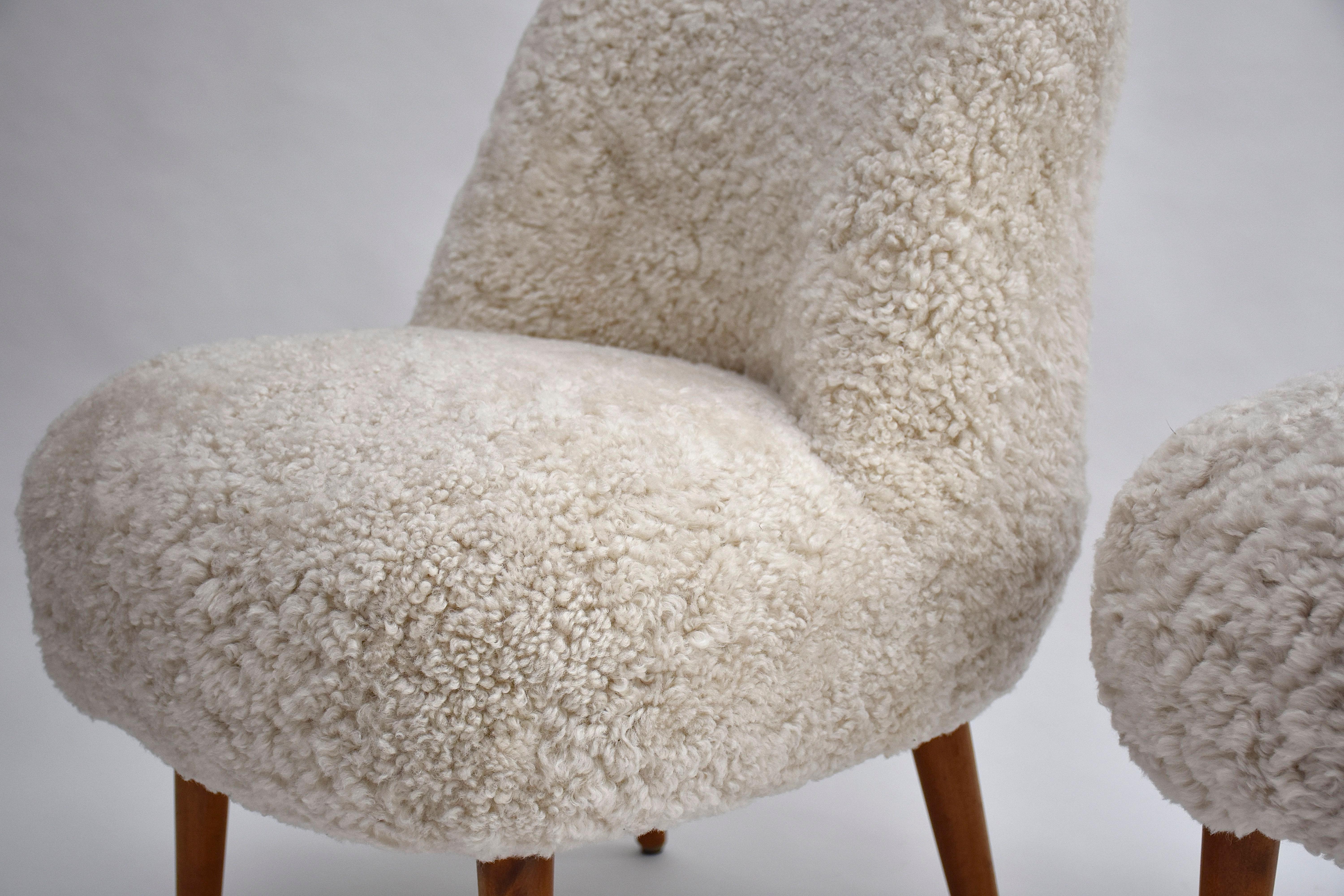 Sheepskin A pair of Swedish design cocktail/lounge chairs or fauteuils. For Sale
