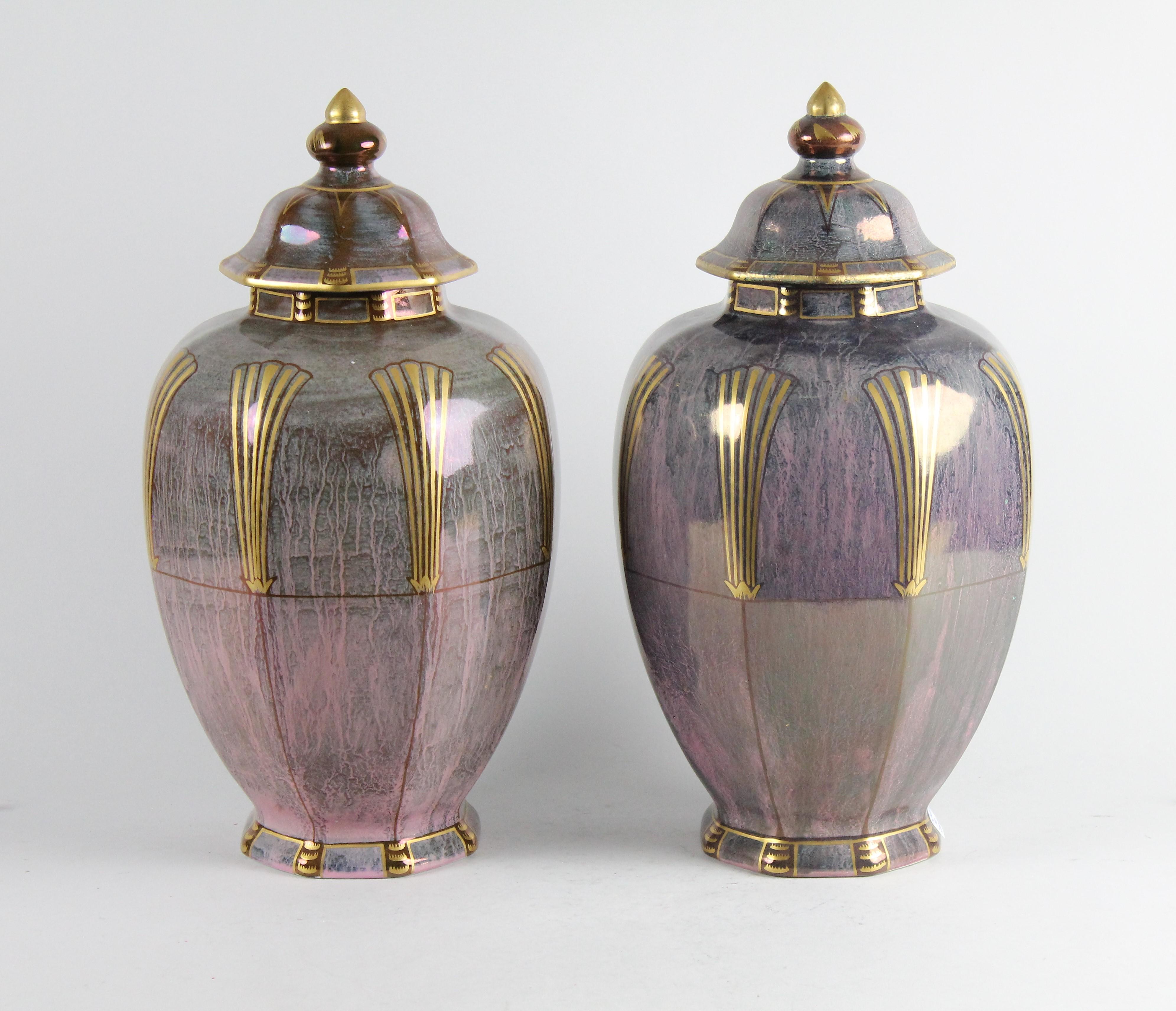 A very unusual pair of lidded urns by Swedish designer Josef Ekberg.
Signed with Josef Ekberg's monogram and Gustavsbergs company mark and also dated 1927.
Handpainted creamware with luster glaze and gold decorations.
Really good condition, with
