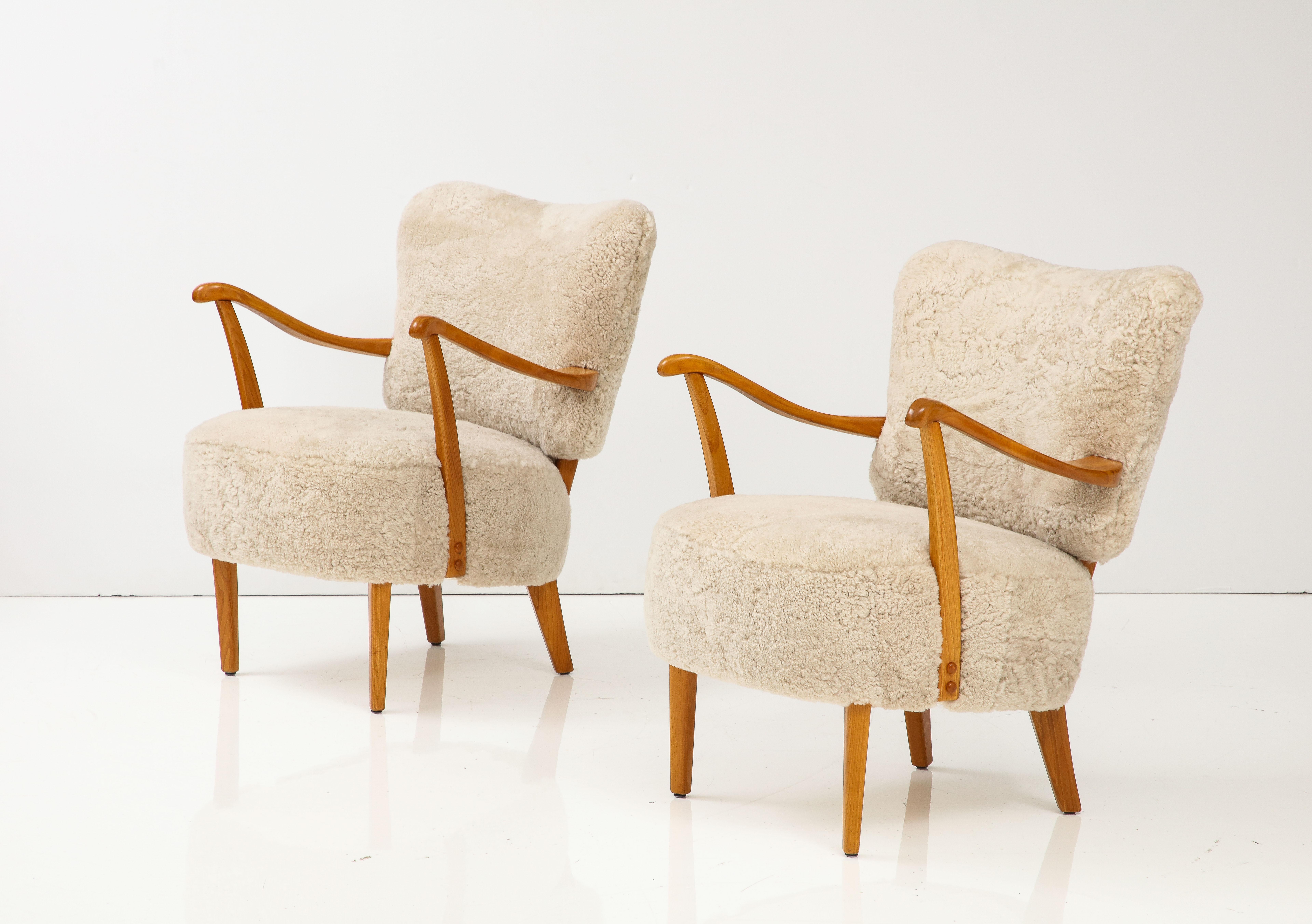 Elm A Pair of Swedish Modern Sheepskin Upholstered Armchairs, Circa 1940-50