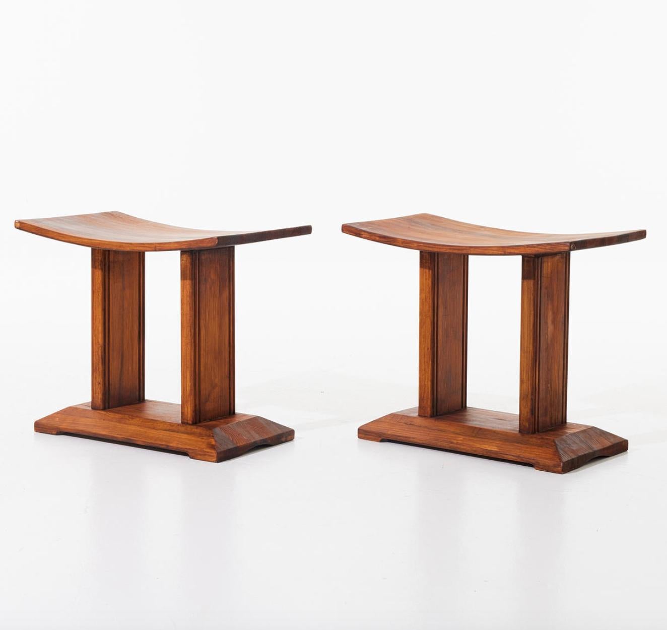 A pair of Swedish pine stools. Stained pine with curved seats. Late 20th century.

H 17.3″.