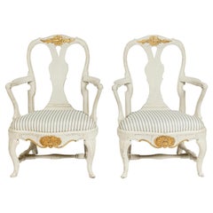 Pair of Swedish Rococo Painted and Gilt Armchairs