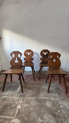 A Pair of Swiss Escabelle Folk side Chairs