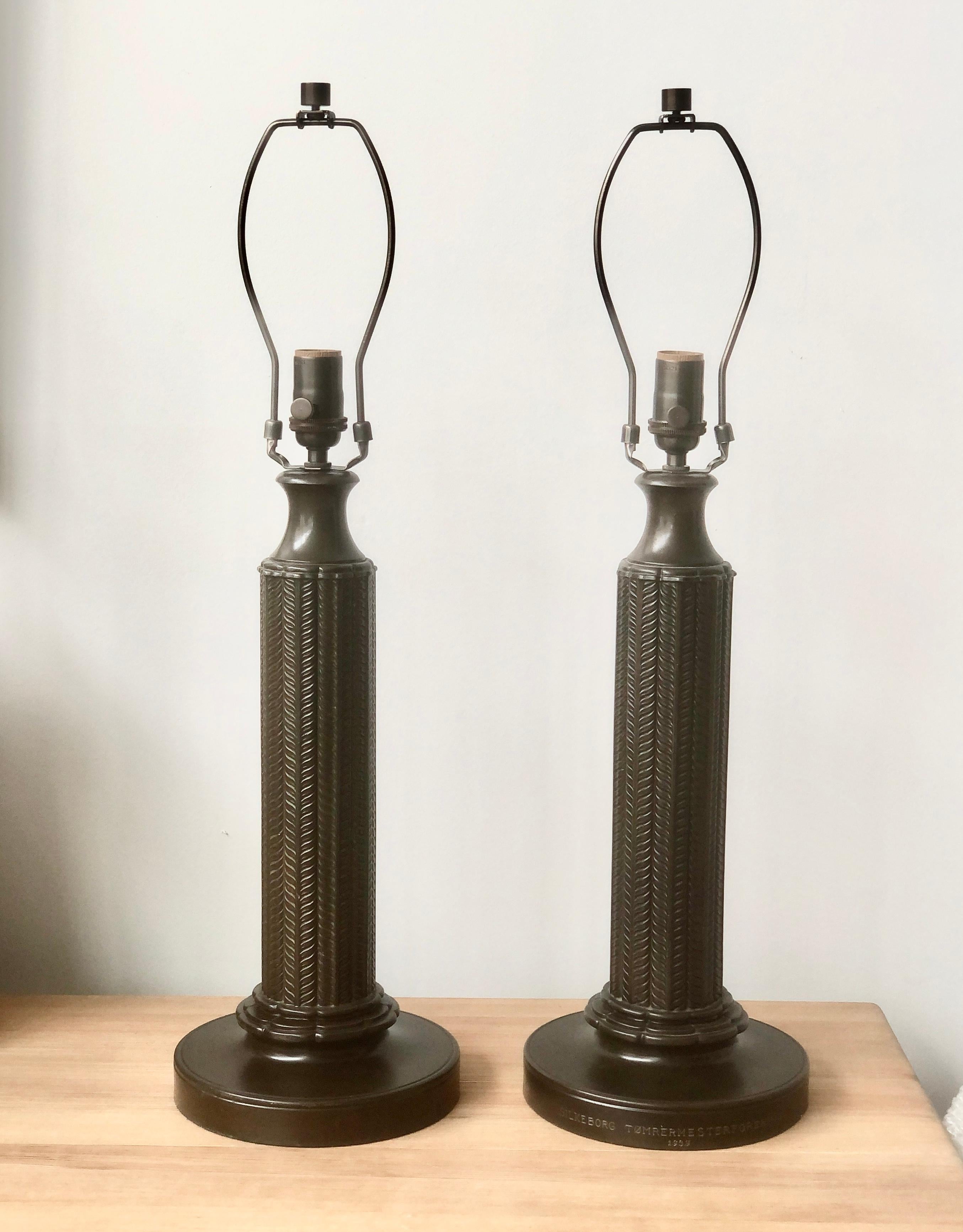 Probably the pinnacle of Just Andersen table lamps creation.
Model 1858, created in 1930th. Patinated Disco metal. Marked Just. A. Denmark 1858.
One lamp with engraving on the base and small dings.
Newly rewired.
Dimensions : Base diam 8