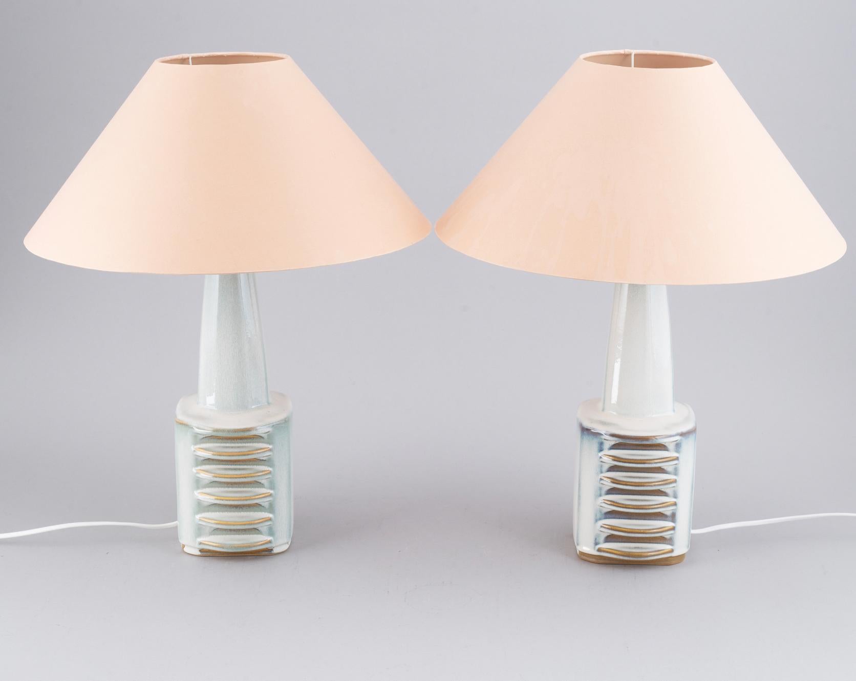 A pair of stoneware table lights, by Einar Johansen for Søholm, Denmark, 1950's/60's.
Signed and marked by manufacturer. 
The shades not available.
Rewiring available upon request.
Can be sold individually.